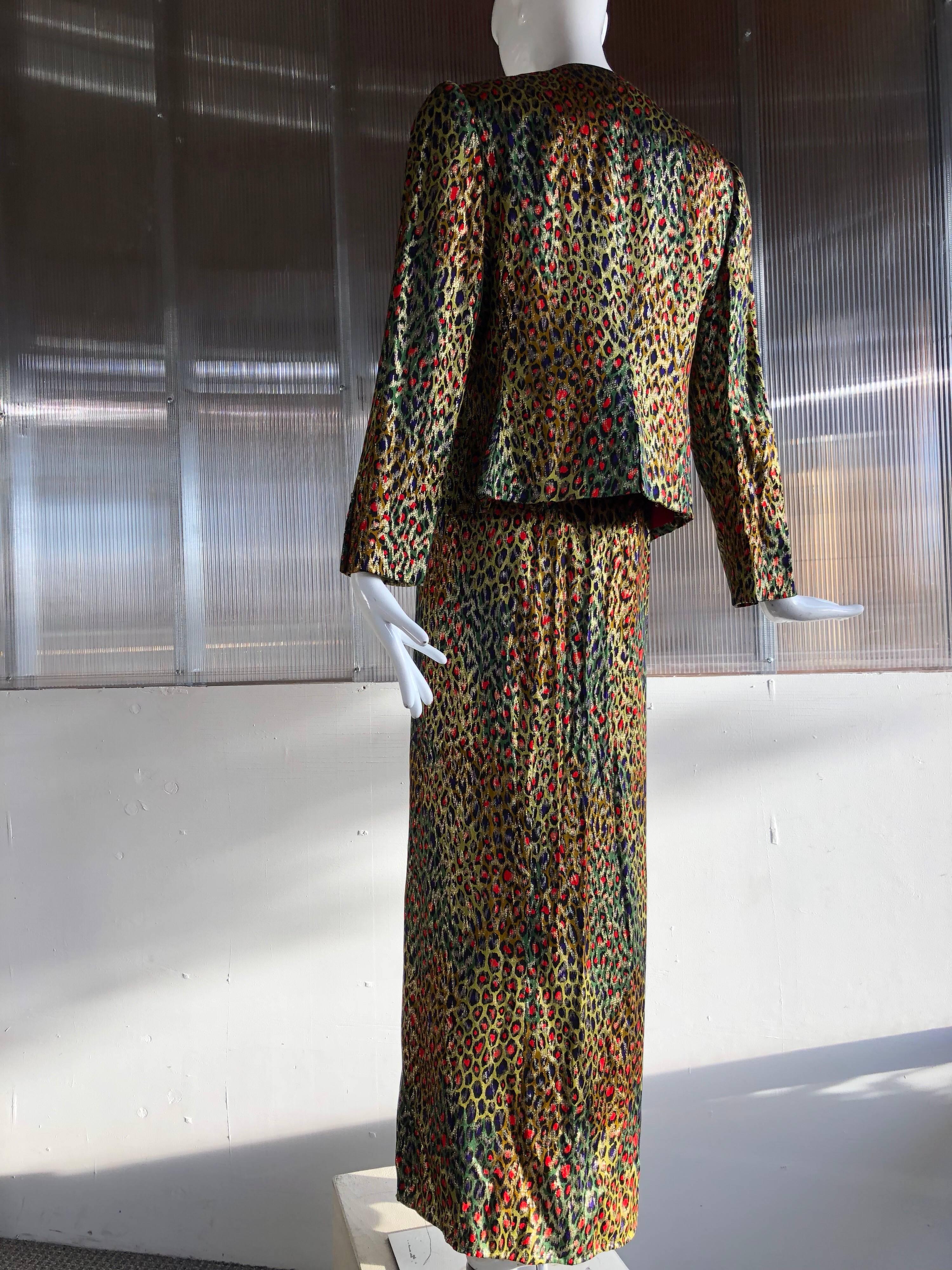 An exciting 1980s Bill Blass silk lame op-art leopard print long skirt and suit jacket set:  The leopard print is shot through with a rainbow of neon colors in the eyes of the leopard pattern!  The skirt is a long wrap style with high slit on right