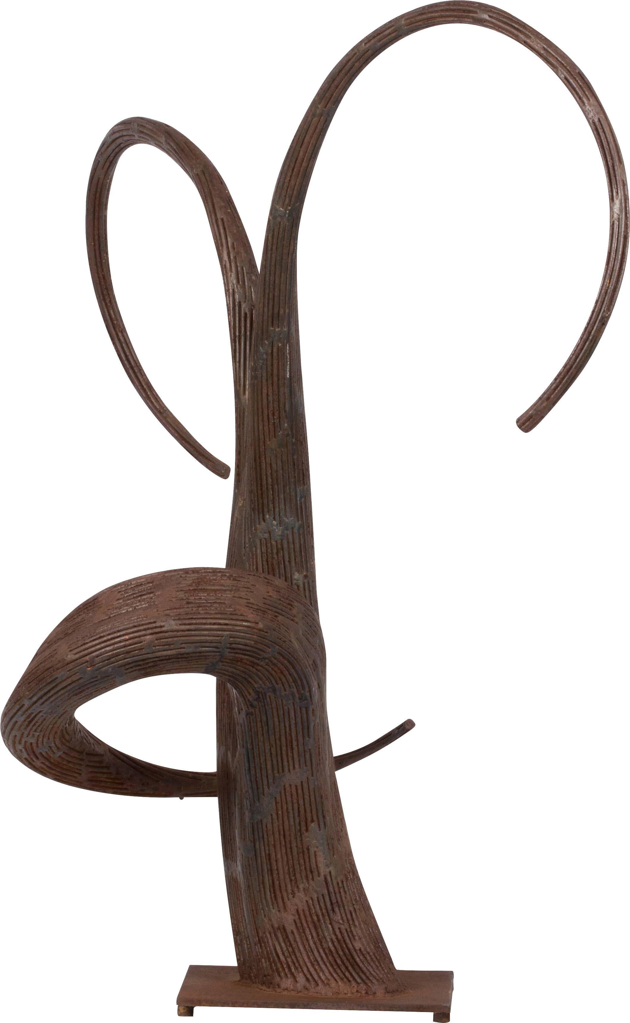 Unusual and dramatic biomorphic cast metal sculpture, circa late 1980s. Sculpture has an organic, tree root like appearance with two curved, root like tendrils protruding upward and the third tendril wrapping around the base of the sculpture.
