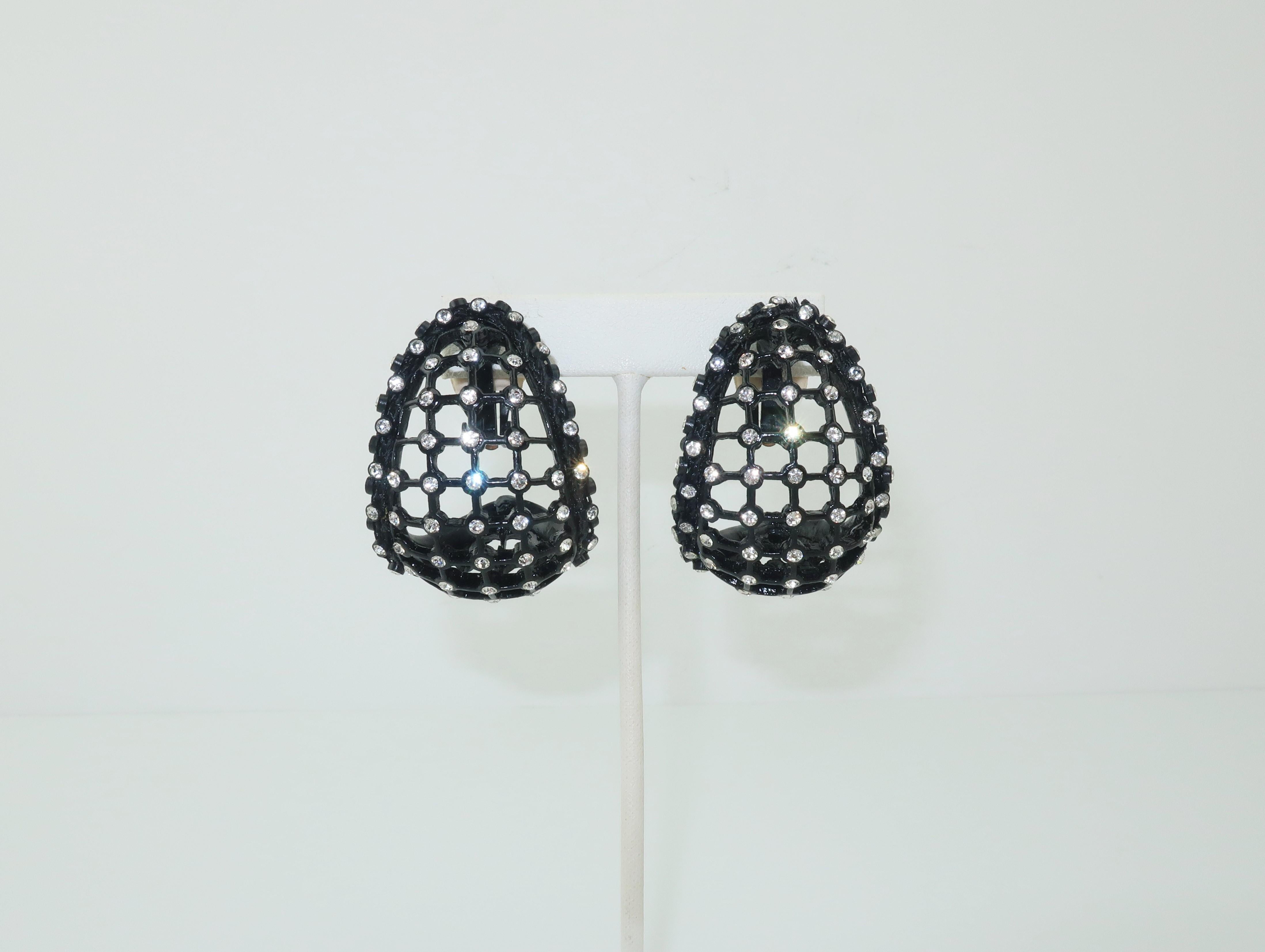 1980's black metal clip on earrings with a scoop style silhouette and a grid cage-like construction accented by rhinestones.  A fun and fashionable accessory to add a little sparkle to your look.  Good condition with slip on pads added by the