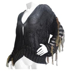 Maglione anni '80 in maglia nera e oro