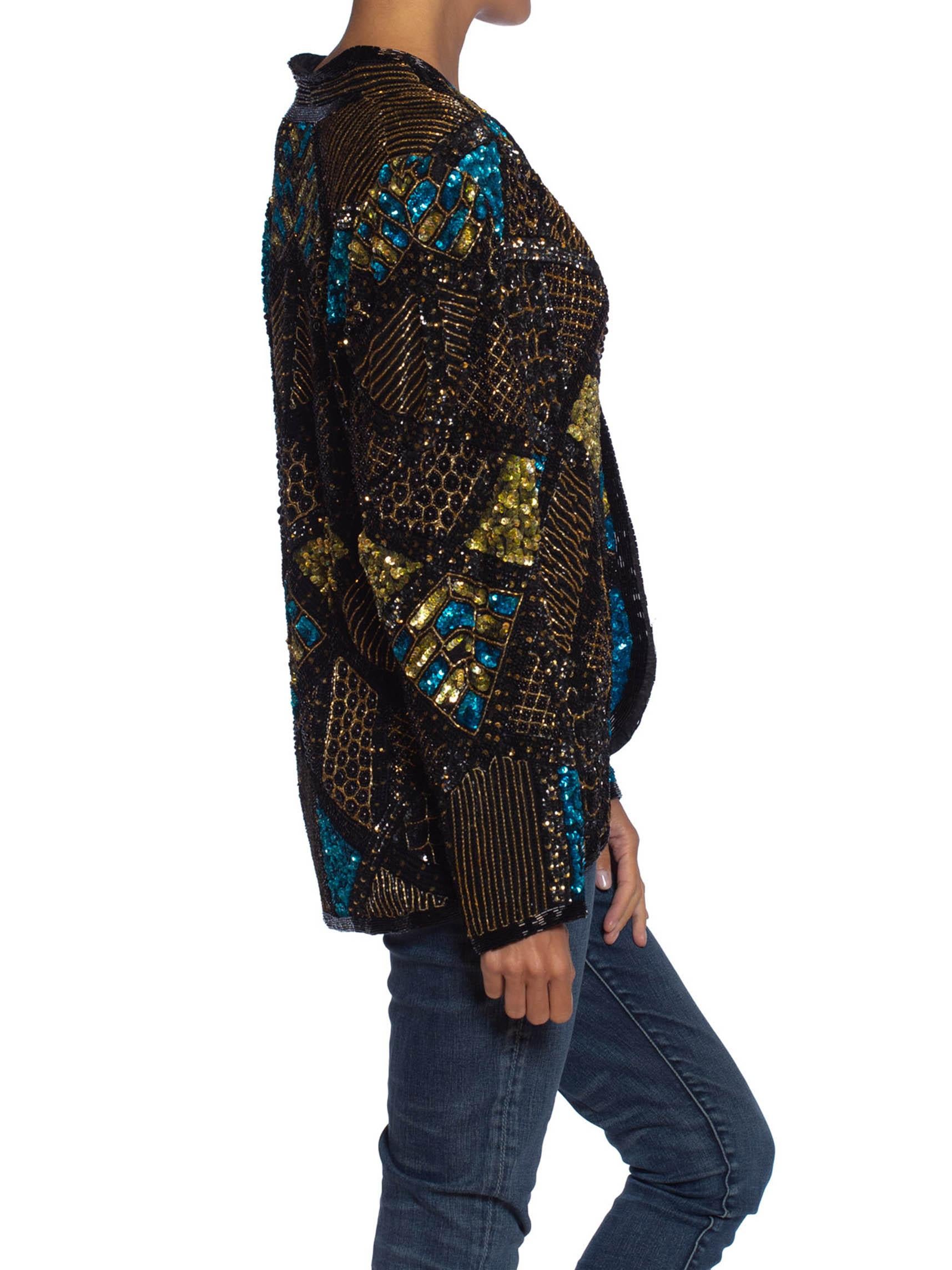 Fully lined in rayon 1980S Black & Gold Silk Beaded Jacket With Teal Sequin Highlights 