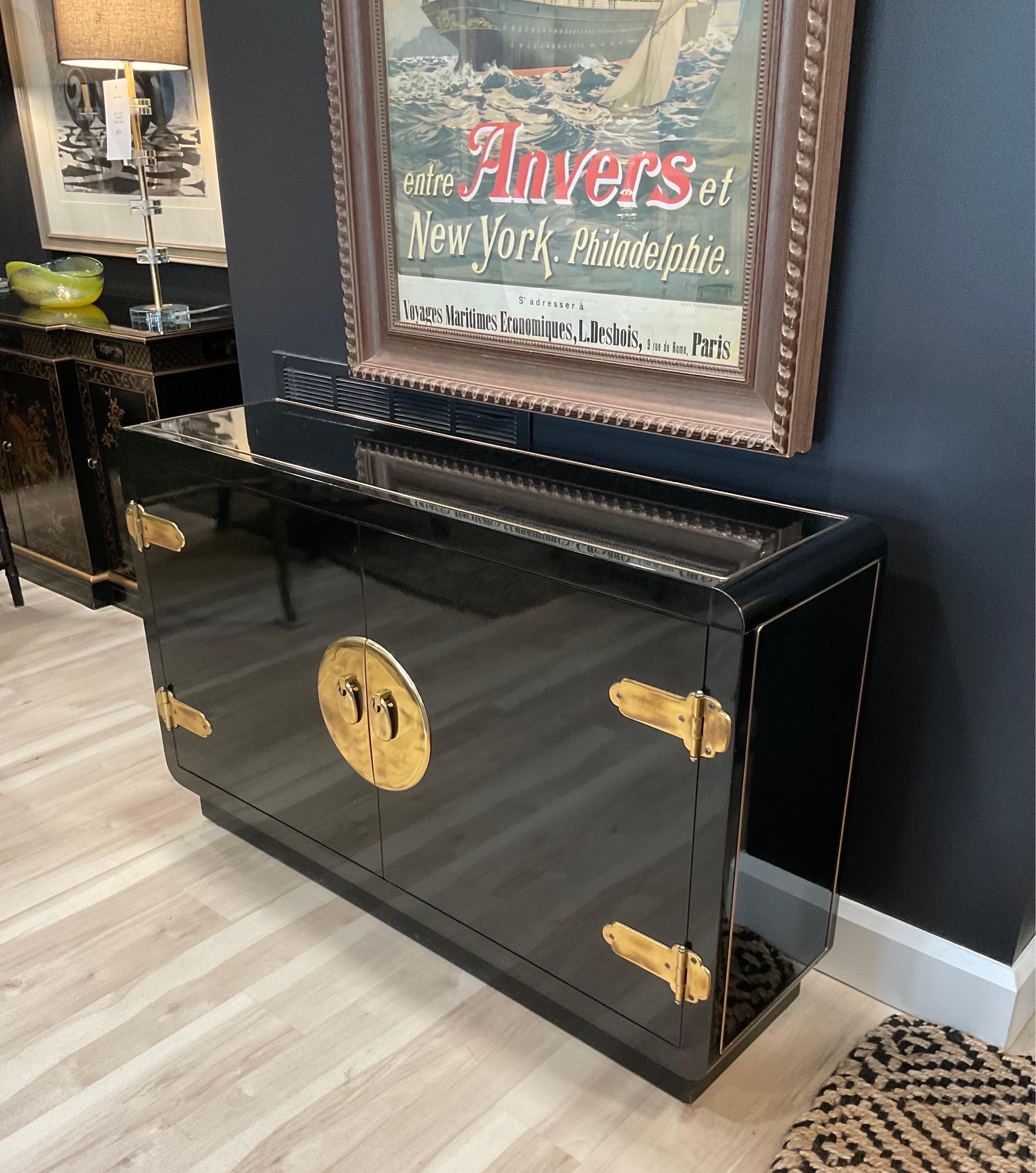 This one's a beauty. Original Owner find this Mastercraft Cabinet has a decidedly asian feel which mixes very well with MCM decor and the mid size of this piece makes it a hit in any environment. As only Mastercraft can these magnificent pieces from
