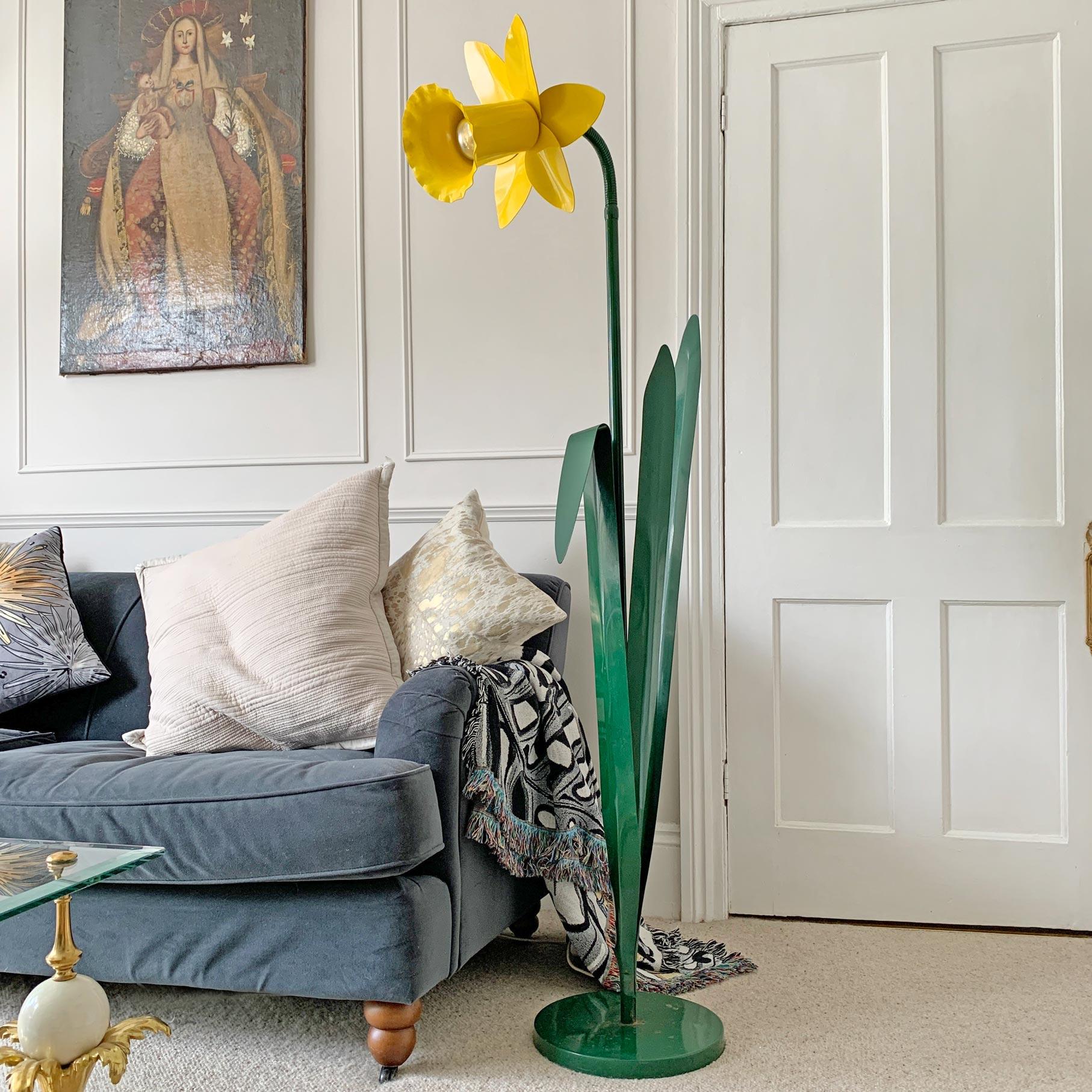 A very large and rare Bliss Daffodil Floor Lamp.

Iconic bright yellow Daffodil Floor Lamp designed by Bliss in the 1980’s. This adjustable neck designer lamp in painted steel is from the UK and is in exceptional condition for it’s age. Small area