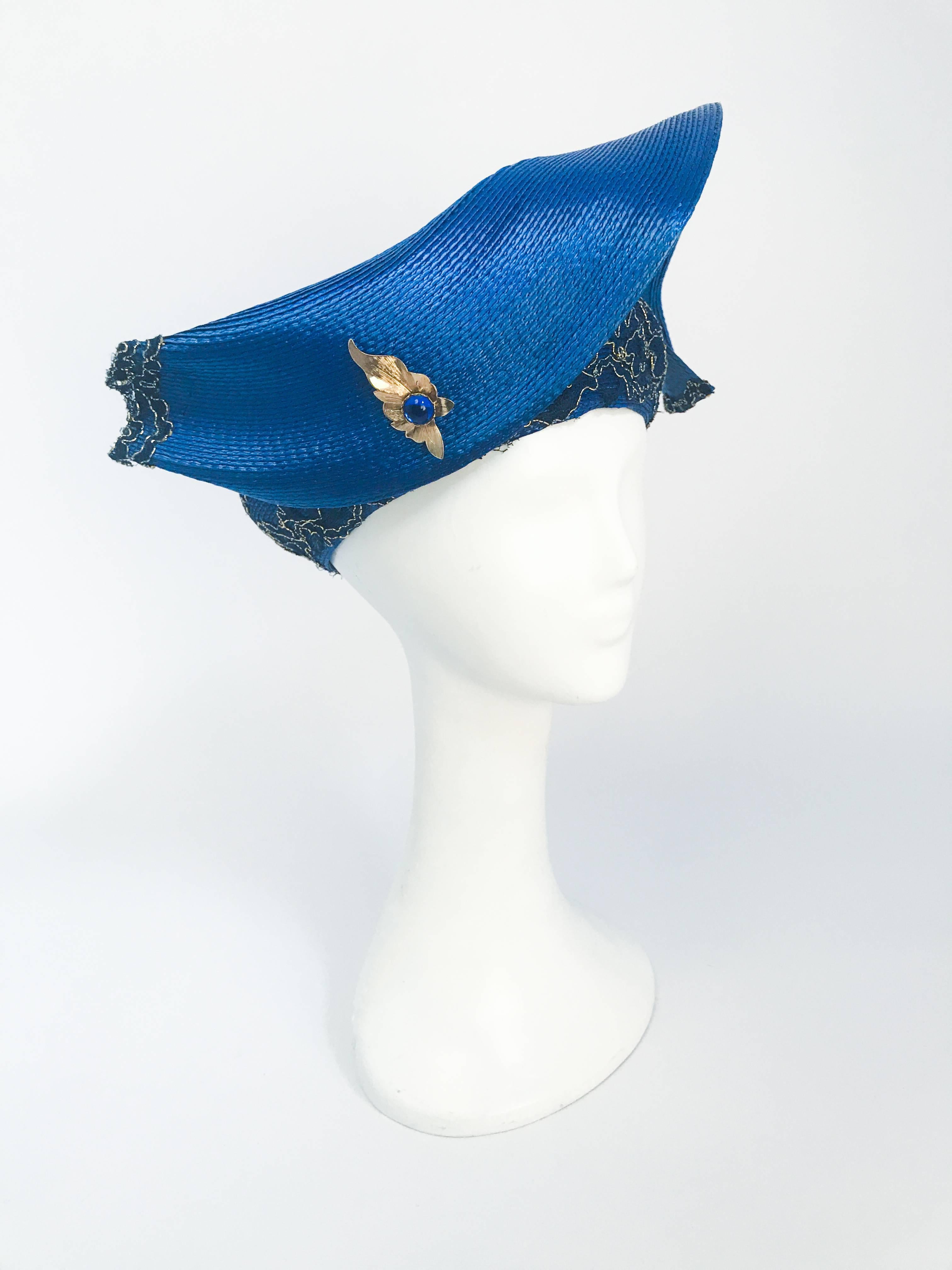 1980s Blue and Gold-tone Structured Hat. Blue woven hat with structured accent and gold-tone and lace embellishment. 21+ inch circumference (size small).