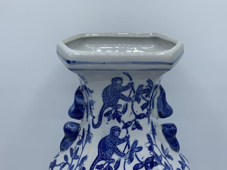 1980s Blue and White Chinoiserie Vase with Monkey Motif at 1stDibs
