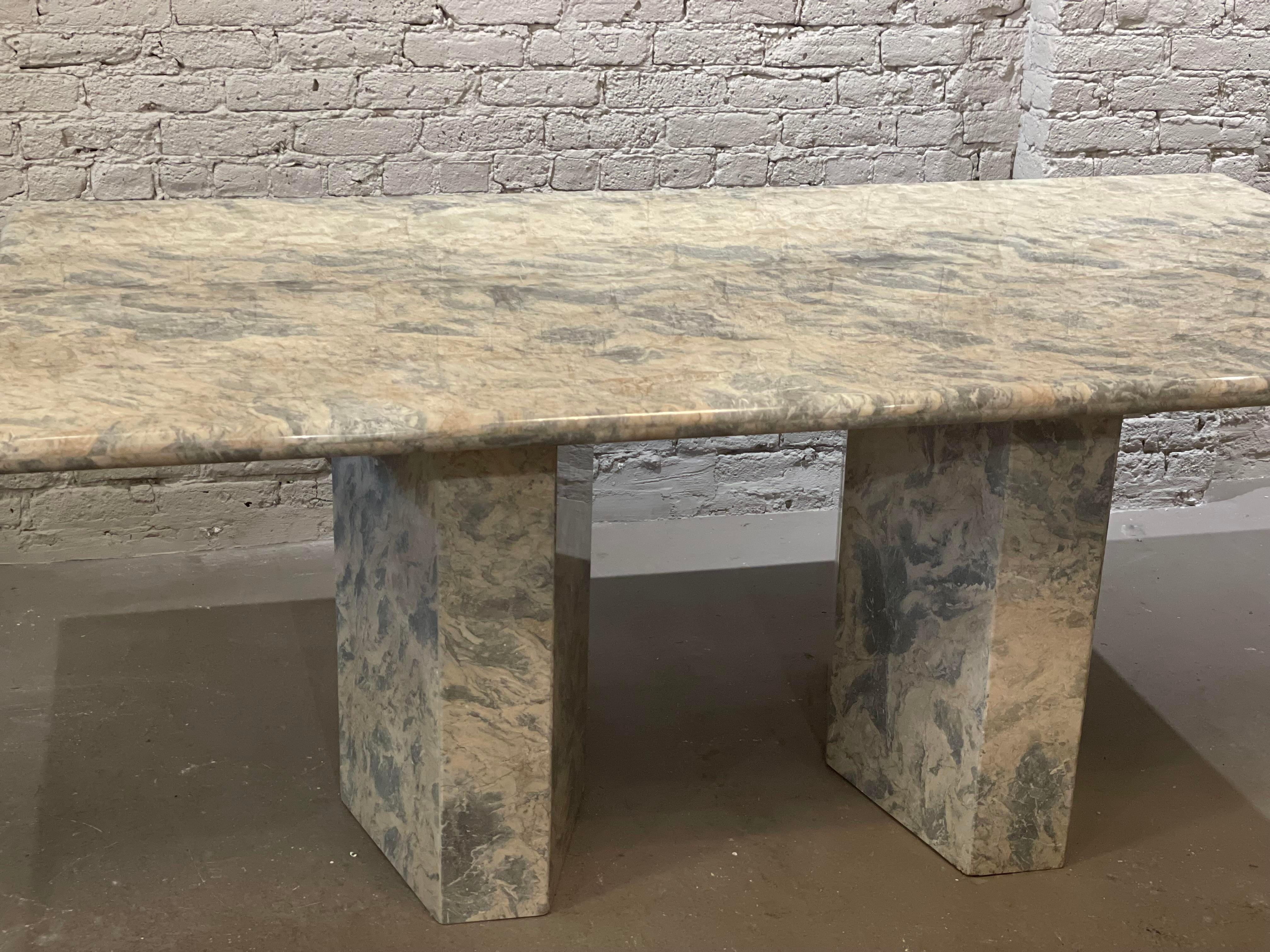 Unbelievable vintage dining table. The marble is the most gorgeous blue gray and ivory. Perfect for a beach house or a neutral palette room. The coating is the original lacquer in excellent condition.