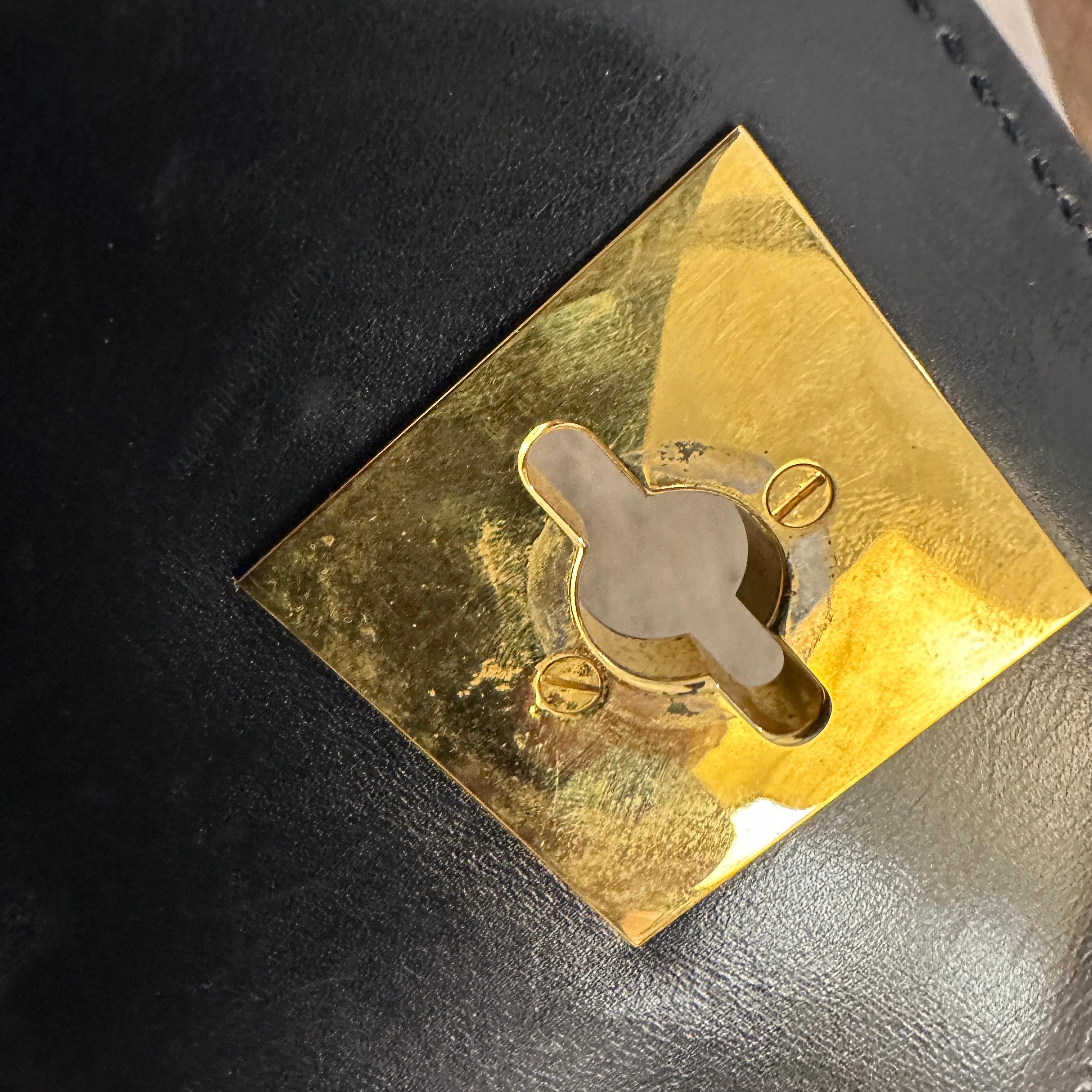 Women's or Men's 1980s Blue Leather and Brass Pochette Clutch Bag by Celine