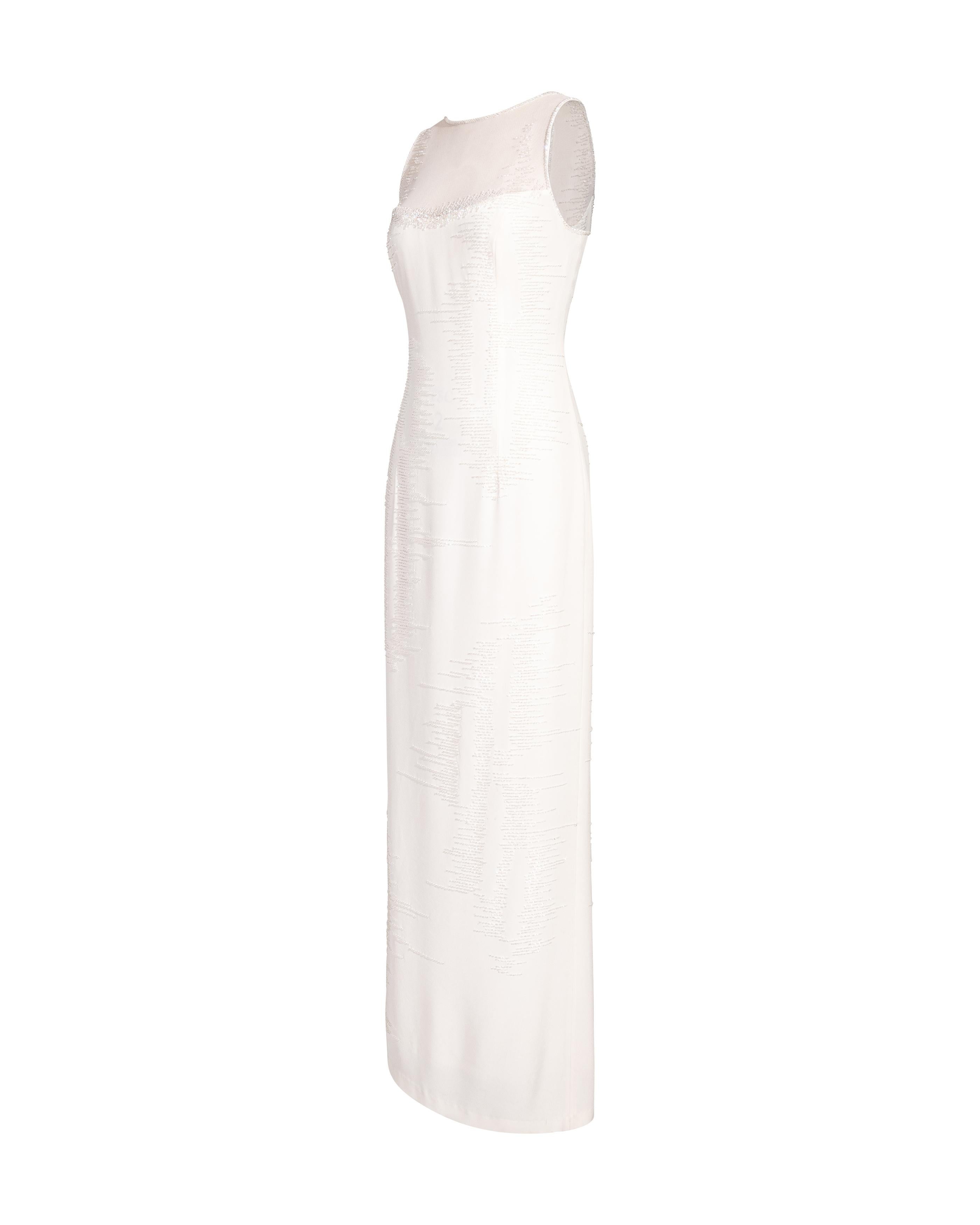 1980's Bob Mackie ivory embellished sleeveless gown. Sleeveless white gown with beaded trim and beaded radiated stripe pattern throughout. Semi-sheer white mesh upper and back. Concealed back zip closure. Fabric Contents: 80% Tri-acetate; 20%