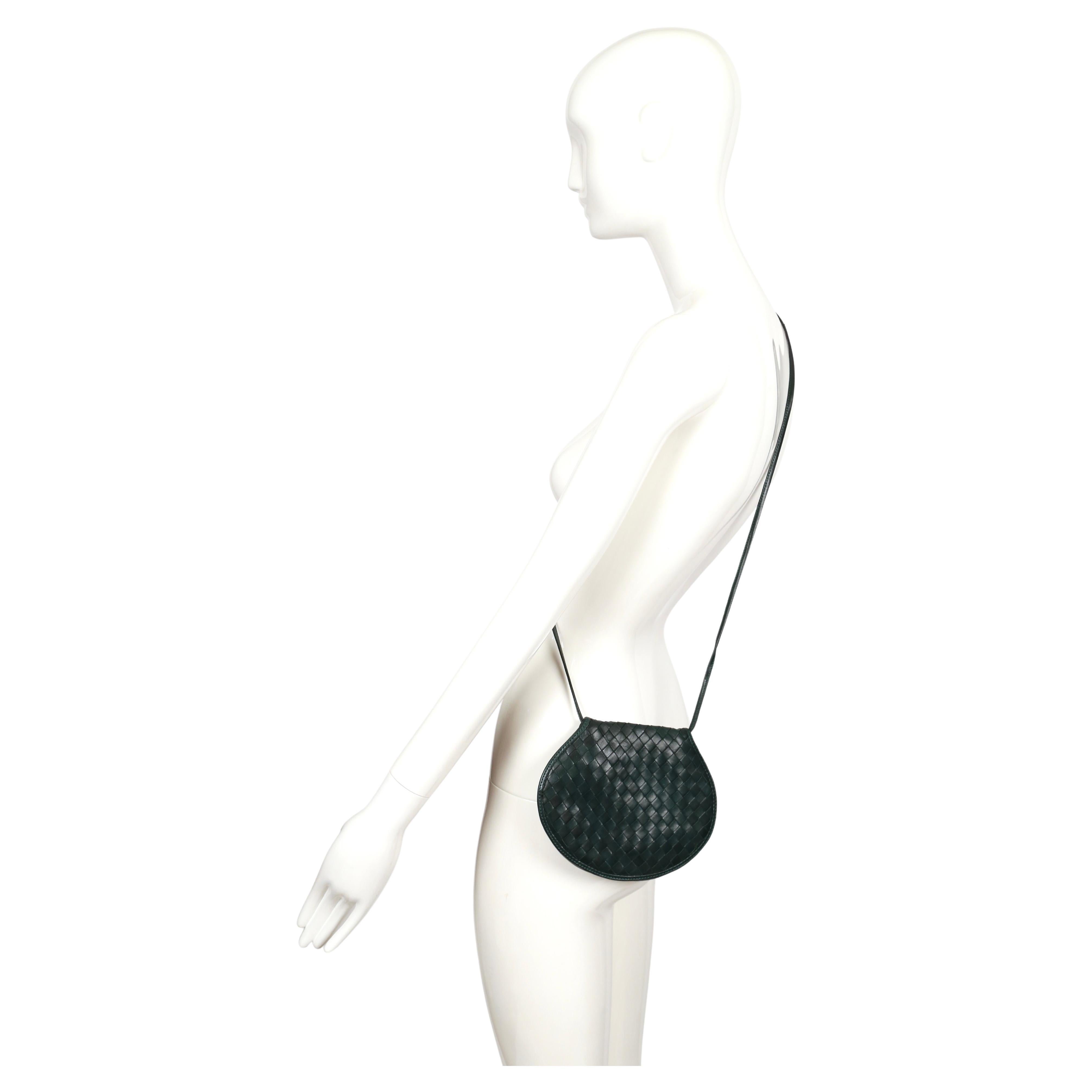Dark-green woven leather bag from Bottega Veneta dating to the 1980's. Bag measures approximately 6.5