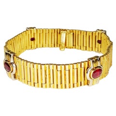 1980s Bracelet Manchette Bullet Rouleaux 18 Karat Yellow Gold and Oval Rubies
