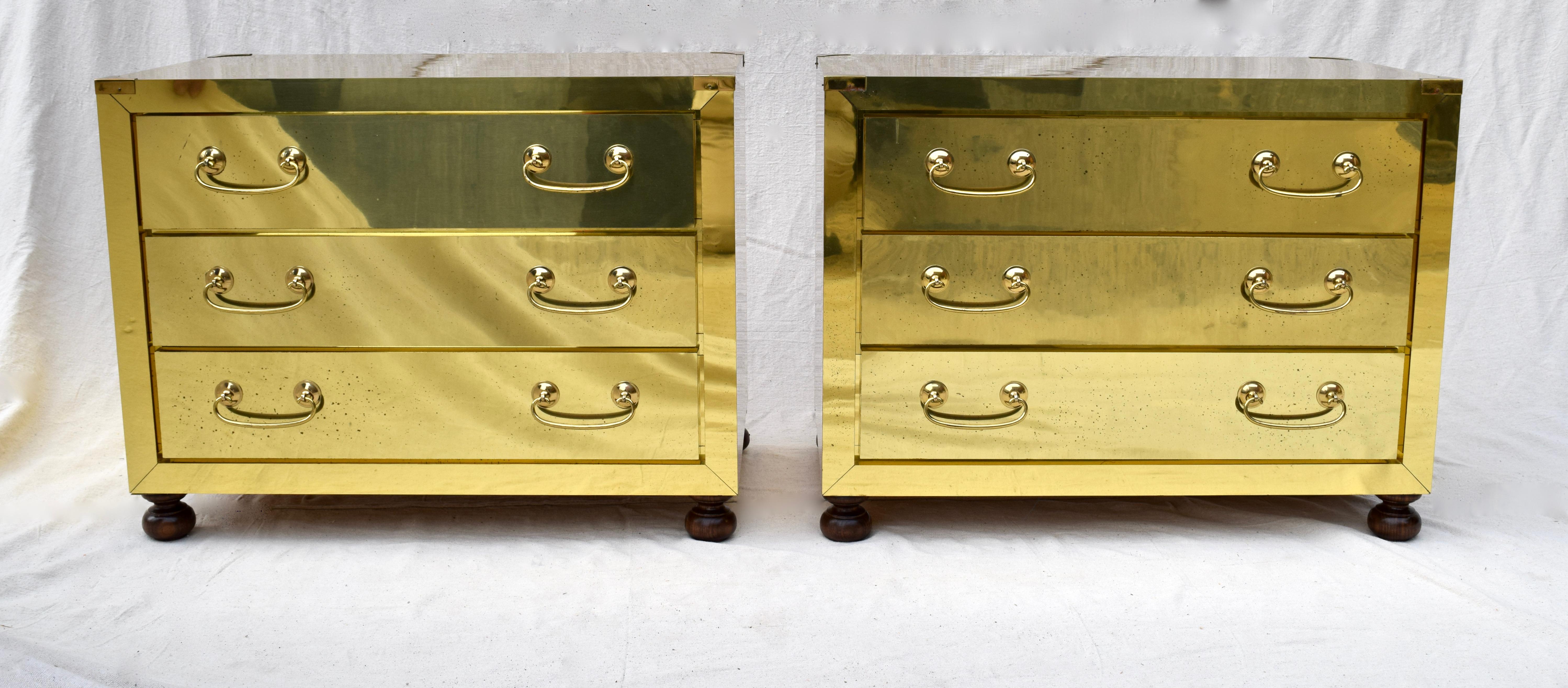 A pair of brass clad three drawer chests with all original finish & walnut canon ball feet.
This marvelous transitional design offers generous storage allowing for versatile placement options.
High quality & very solid.