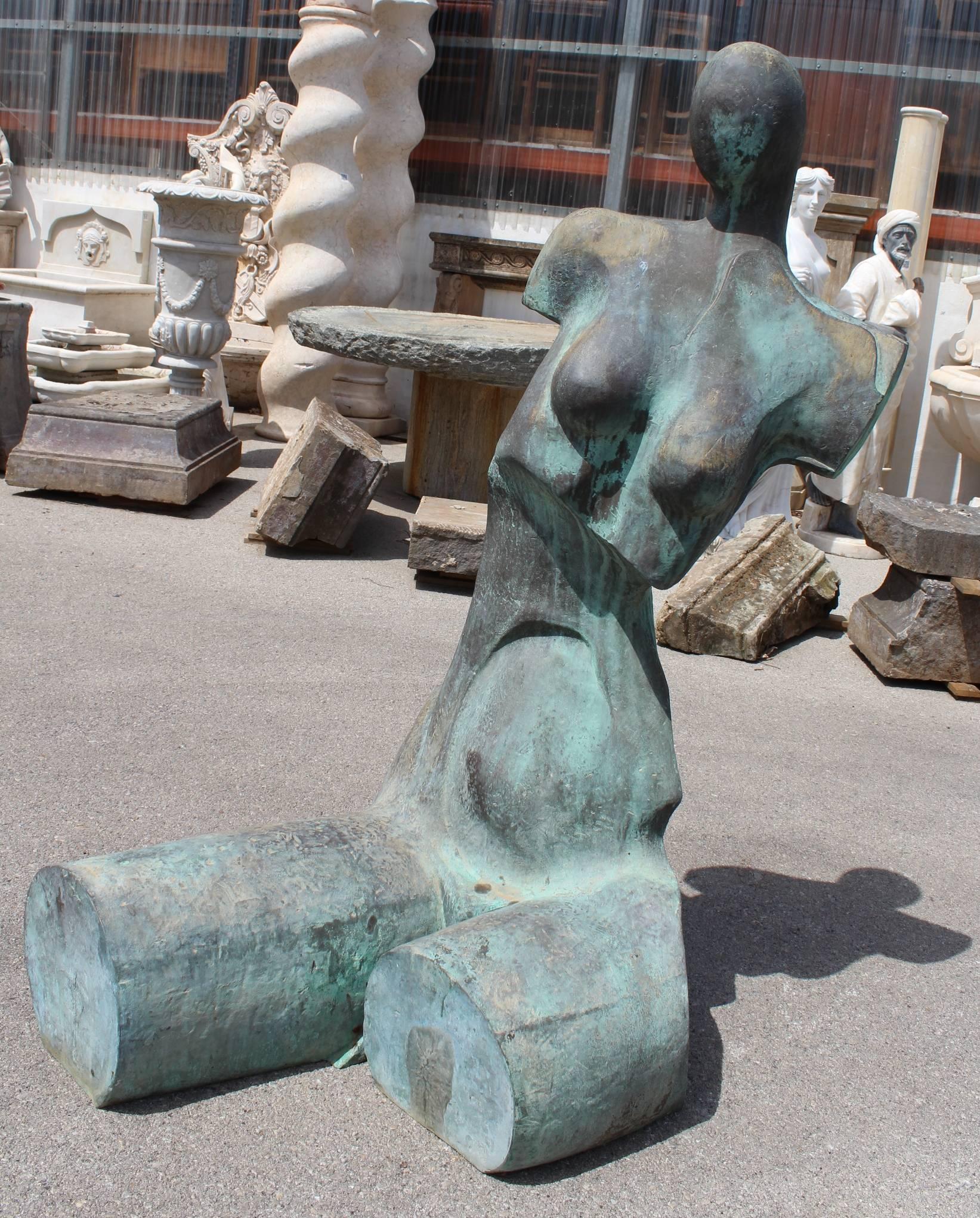 1980s bronze abstract sculpture of a naked woman sitting.
   