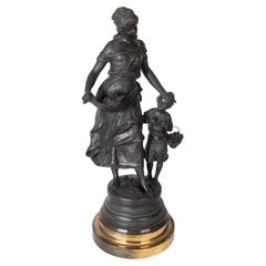 1980s Bronze Sculpture of a Woman with Her Daughter on a Round Base. Signed