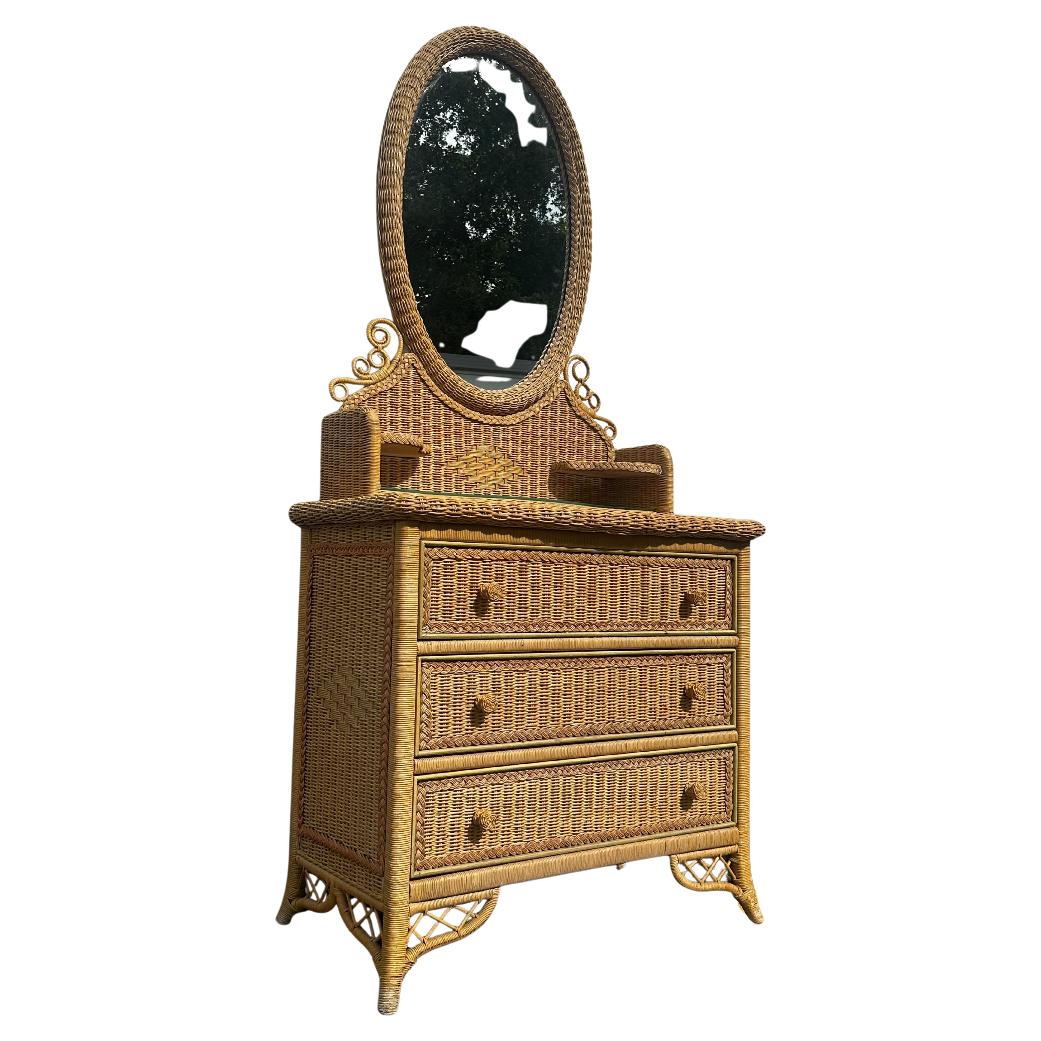 Cassettone Budji anni 
80 in bambù bruciato e rattan intrecciato in vendita