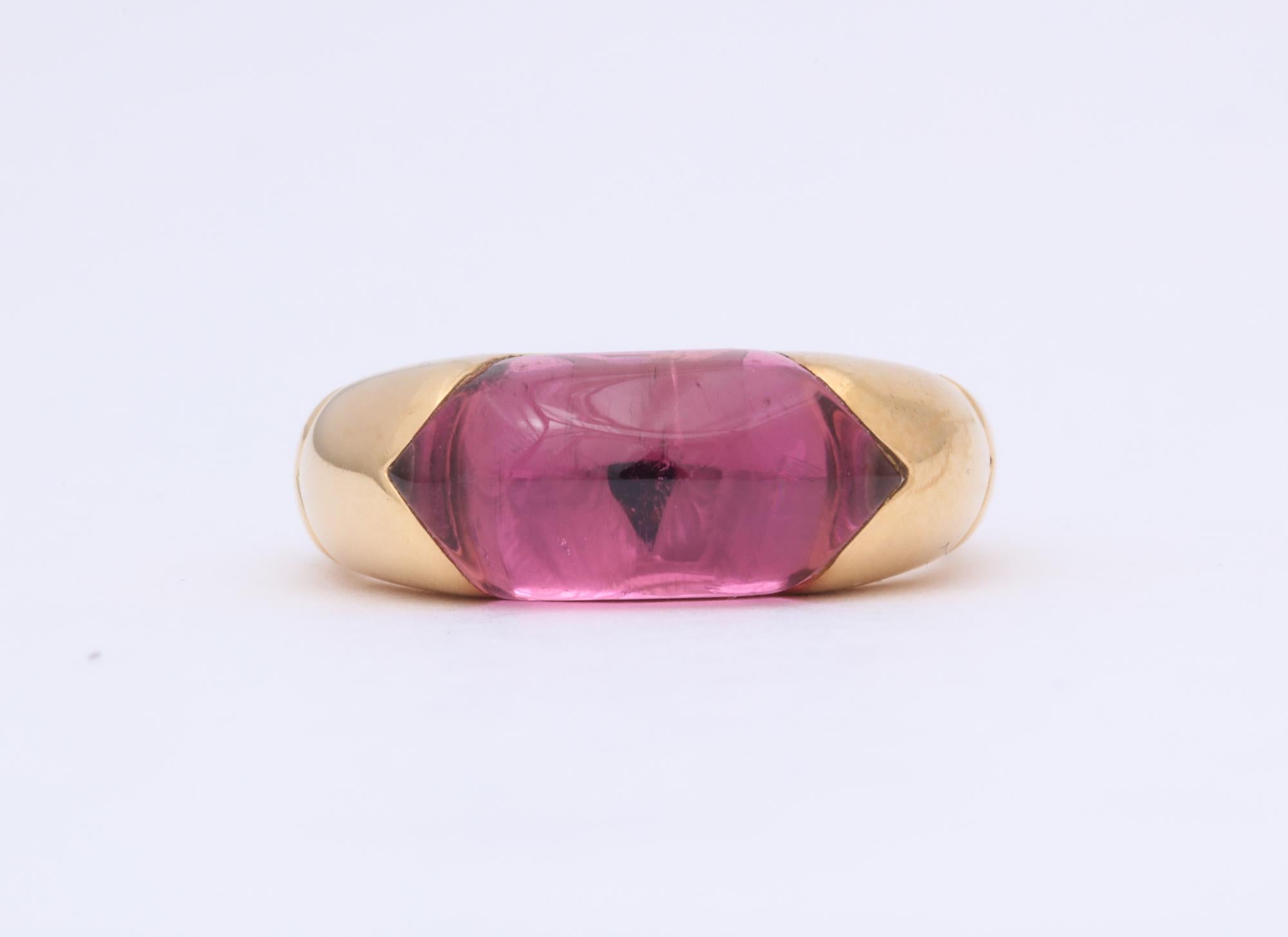 One Band Style Ring Embellished With A Custom Cut Sugarloaf Cut Pink Tourmaline Weighing Approximately Four Carats. Signed Bulgari Italy Circa 1980's Ring Size 6 And May Be Resized.