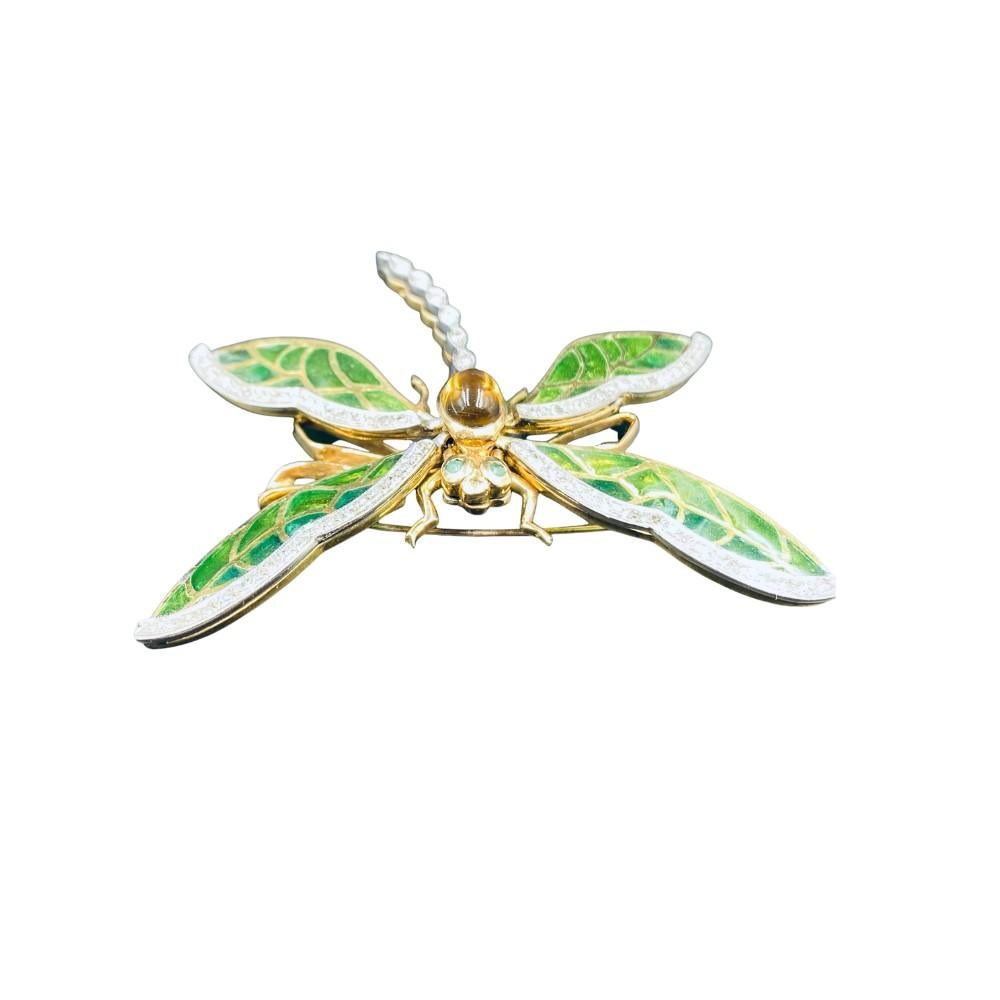 Butterfly pin featuring  citrines, diamonds and emerald, with flexible lifelike movements. 
Overall in very condition with slight wear consistent with age.  
Pin Details
Dimensions	40mm X 60mm
Creator/ Maker 	Unknown 
Metal 	18K gold 
Weight 	 
