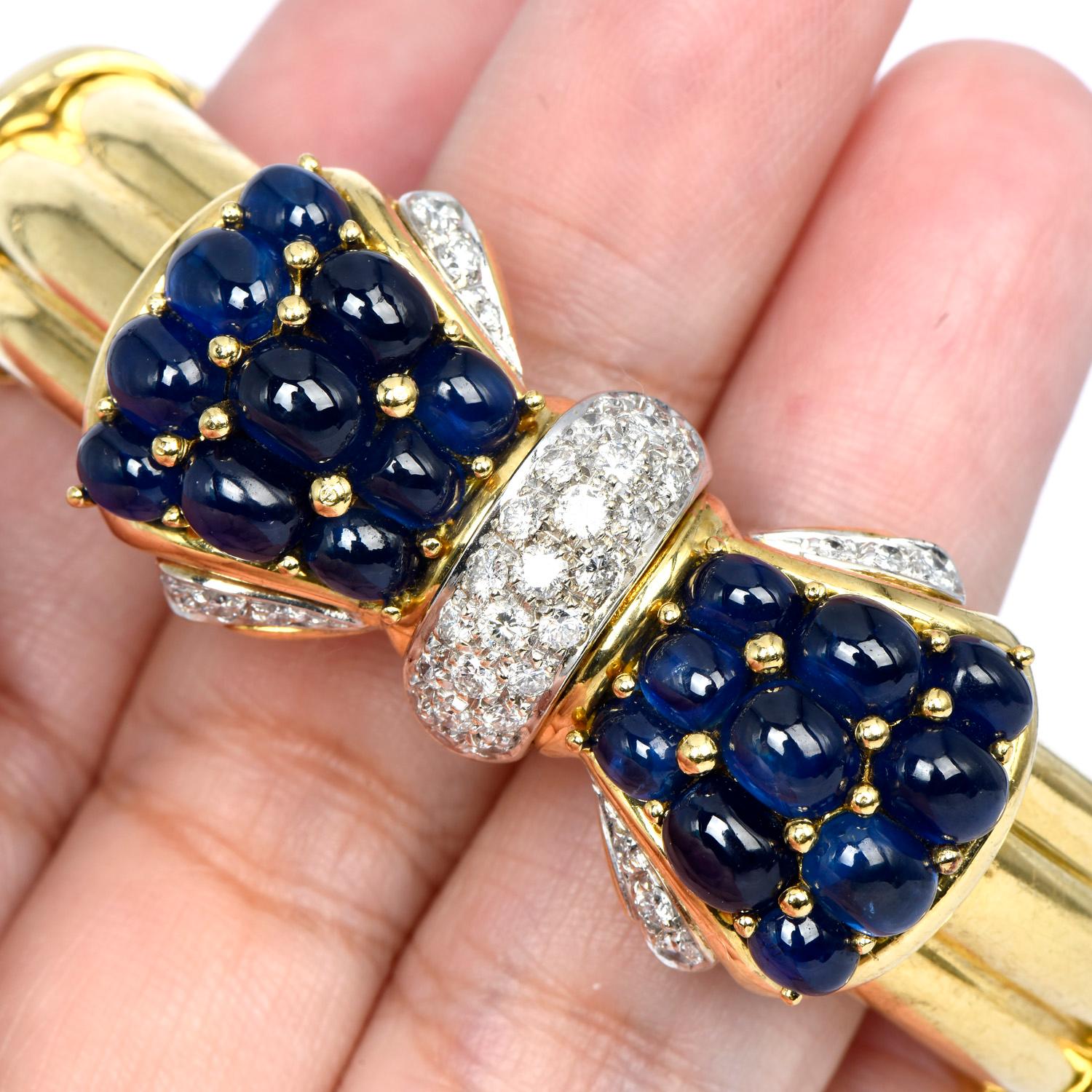 Round Cut 1980's Cabochon Blue Sapphire Diamond 18K Gold Bow Cuff Bangle Bracelet For Sale