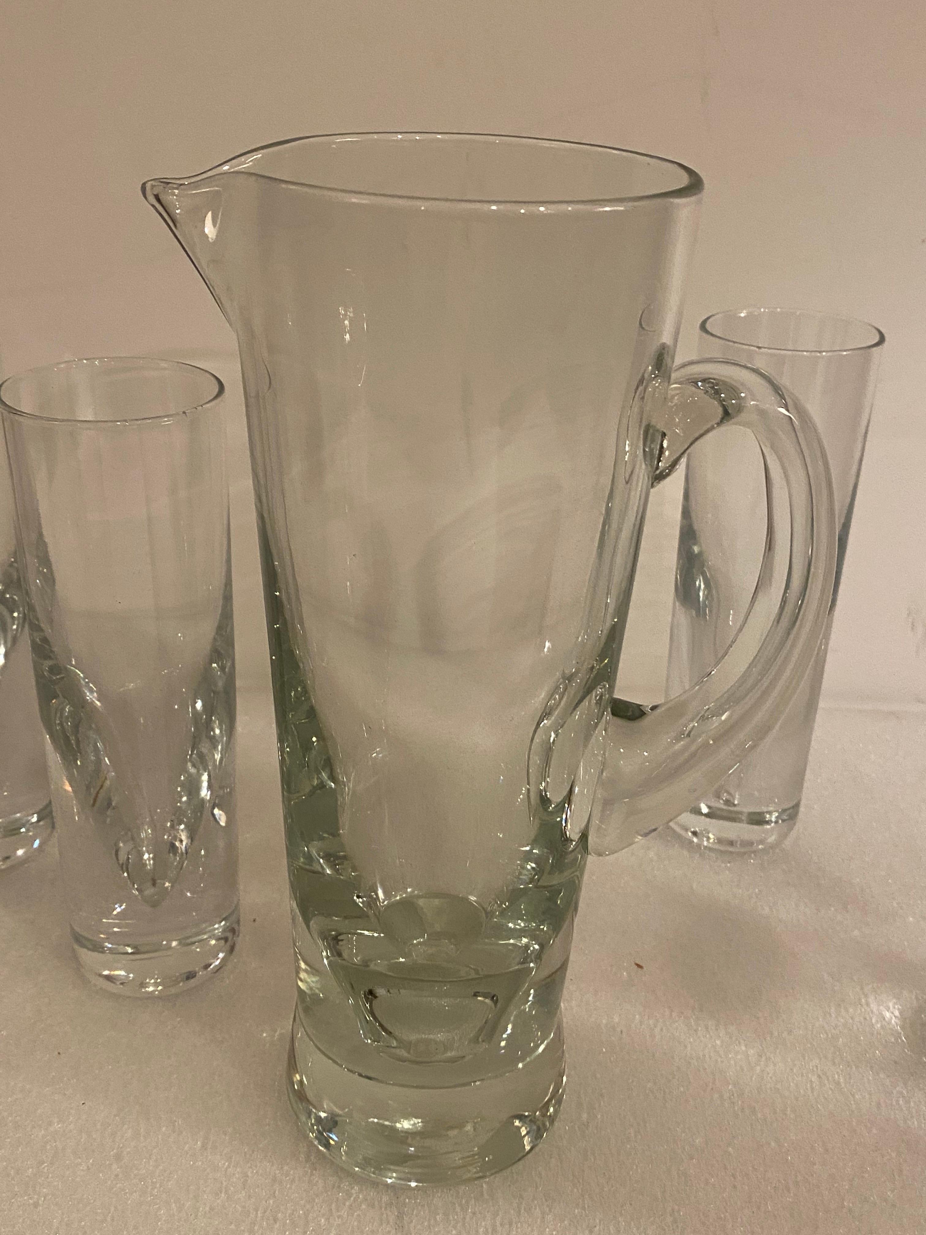 Carlo Moretti 7 Piece Bullet Glass Drink Set.  Nice complete set in great shape, probably unused!  Great heavy weighted glass and pitcher.