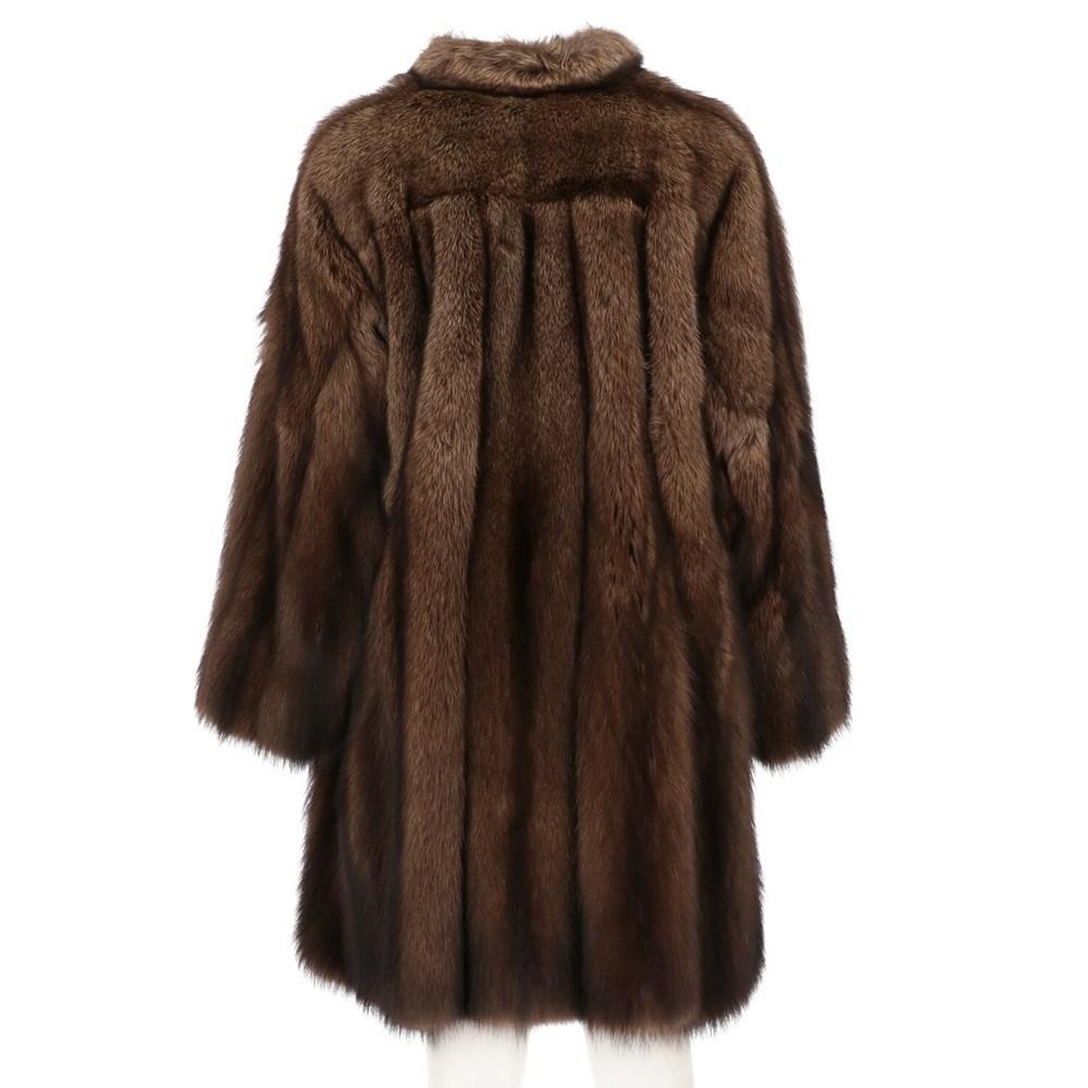 Carlo Tivioli by Mario Borsato marten fur. Cape model with neck bow fastening, long sleeve and over fit. Two frontal welt pockets Lined.

Size: M/L

Flat measurements
Height: 97 cm
Bust: 60 cm
Shoulders: 40 cm
Sleeves: 57 cm

Notes: Please note that