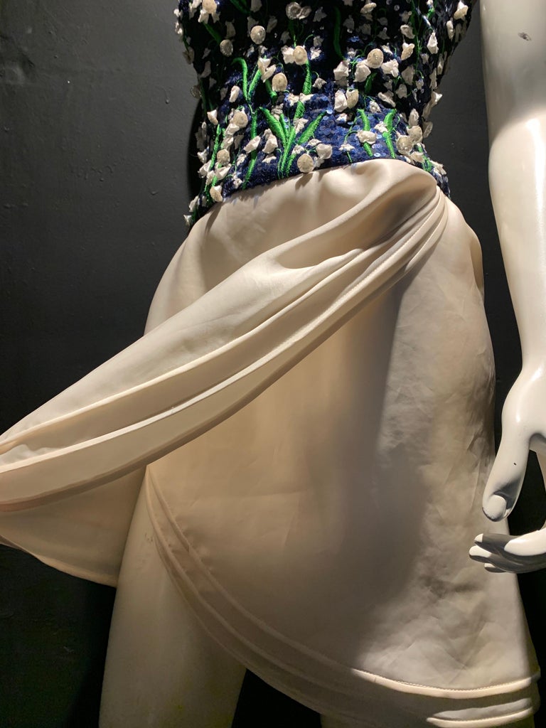 1980s Carolina Herrera Lily of the Valley Strapless Cocktail Sarong Mini  Dress For Sale at 1stDibs | lily of the valley print dress, lily of the  valley dress, lilly of the valley