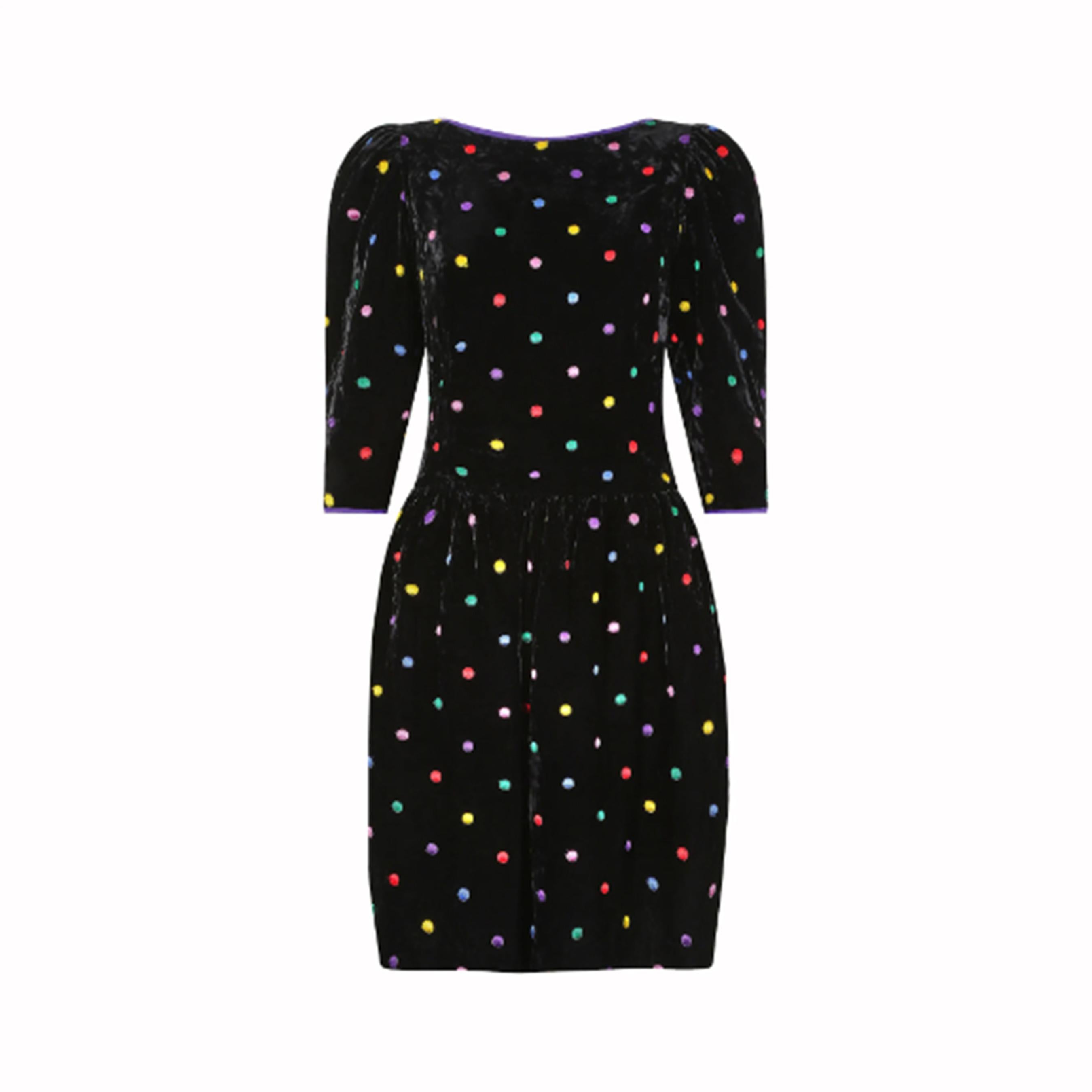 This late 1980s or early 1990s black velvet polka dot dress by Caroline Charles would make the perfect seasonal party piece! It features a wide boat neckline with purple silk contrast edge, and puff 3/4 length sleeves which add structure to the