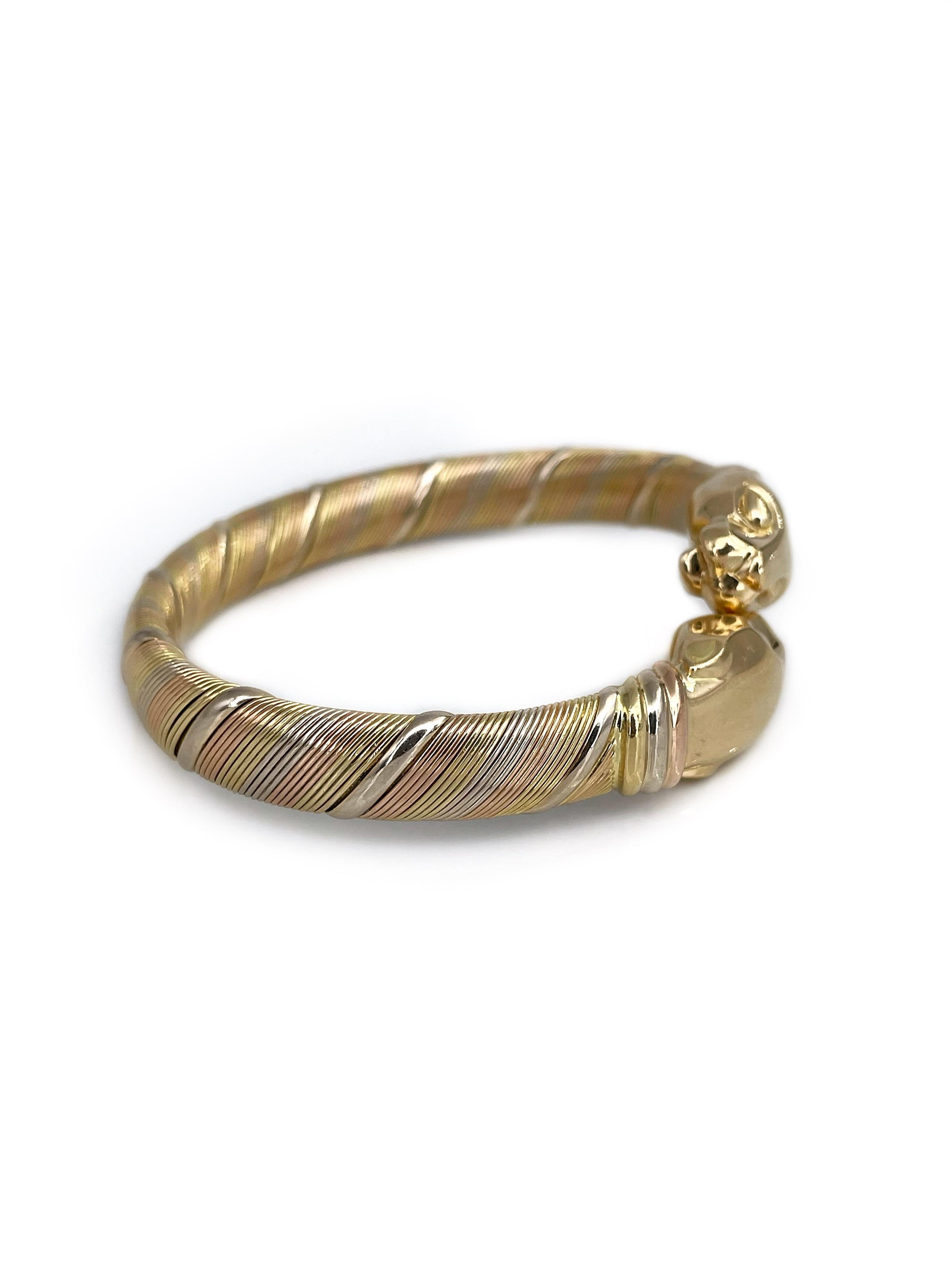 Moderne Cartier Bracelet manchette panthère à double tête en or tricolore 18 carats des années 1980 en vente