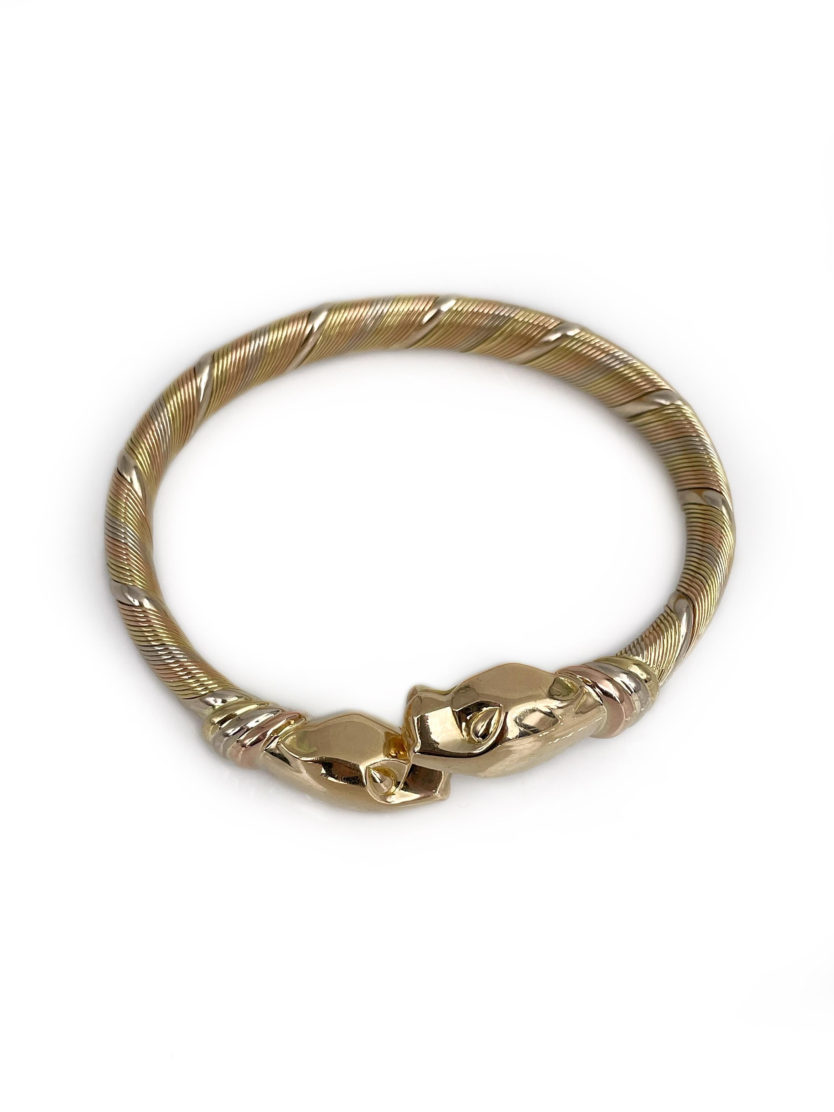 Cartier Bracelet manchette panthère à double tête en or tricolore 18 carats des années 1980 en vente 1