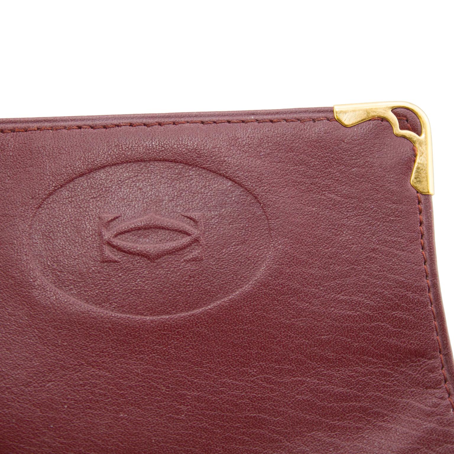 1980s Cartier Burgundy Leather Billfold Wallet With Fold-Over Closure In Good Condition In Toronto, Ontario