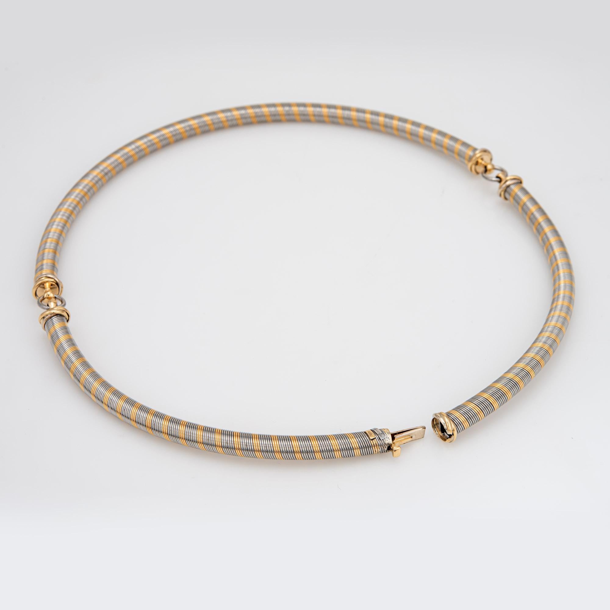 Vintage Cartier Halskette aus Edelstahl und 18 Karat Gelbgold (ca. 1980er Jahre).  

Die Halskette misst 16 Zoll in der Länge und ist so konzipiert, dass sie im Nacken sitzt. Der eng gewickelte Edelstahl und das 18-karätige Gold fühlen sich glatt an