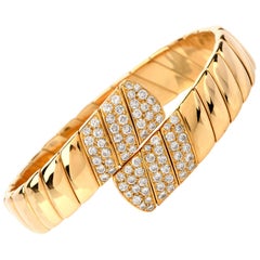 1980s Cartier Diamond 18 Karat Gold Bypass Cuff Bangle Flexible Bracelet
