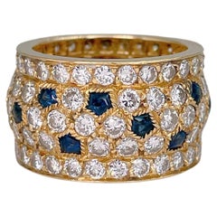 Retro 1980s Cartier Nigeria 18K Gold 4.4ct Diamond 1.1ct Sapphire Eternity Band Ring