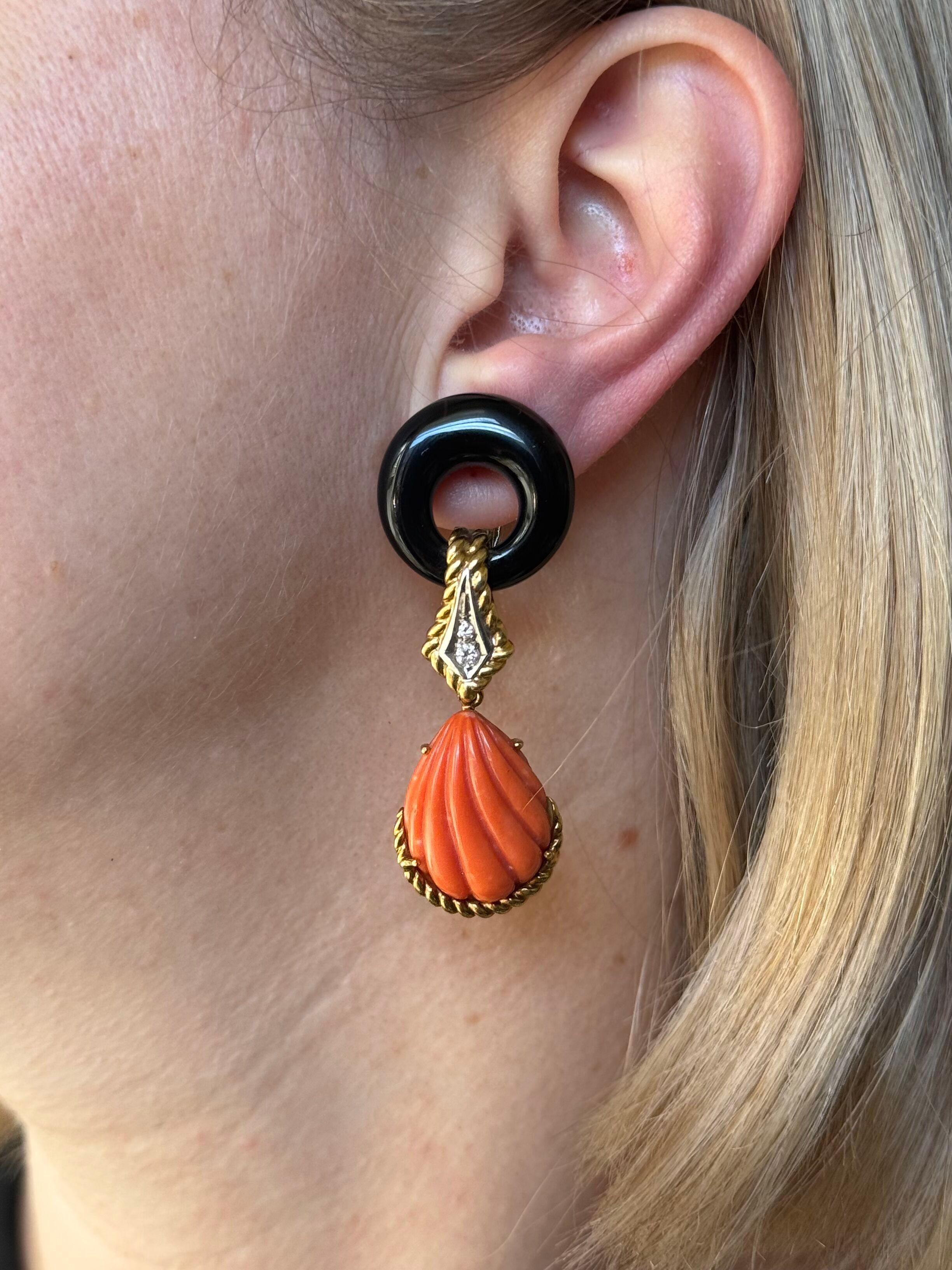 Pair of Italian 1980s 18k gold drop earrings, set with carved coral, onyx and approx. 0.20ctw in diamonds. 
Earrings measure 2 3/8