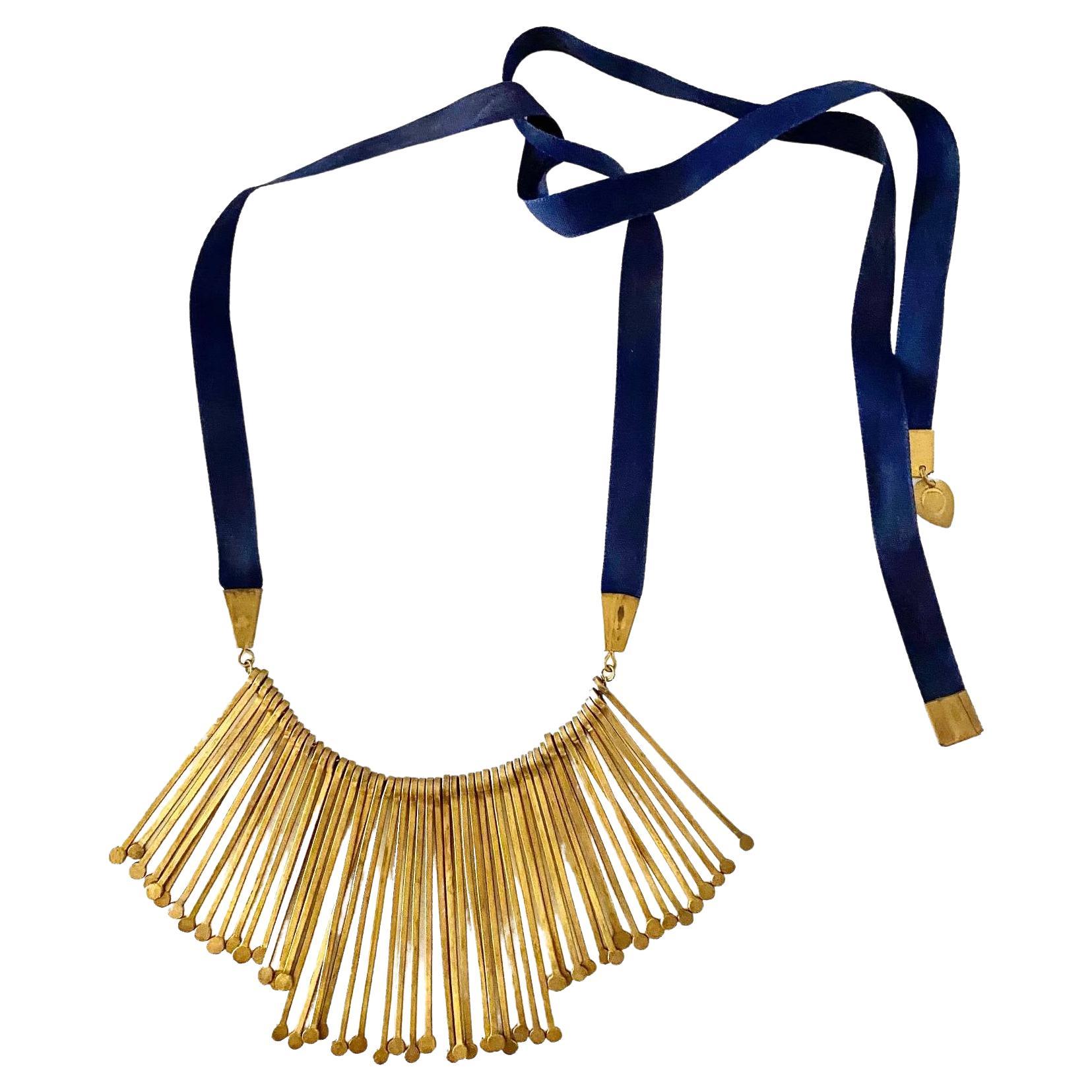 Vintage Celine Fringe Statement Brass Tib Black Ribbon Necklace with signed charms, 1980’s. made of brass  This classic piece brings timeless style to any ensemble. The metal components ensure durability, so it is sure to last for years to come.