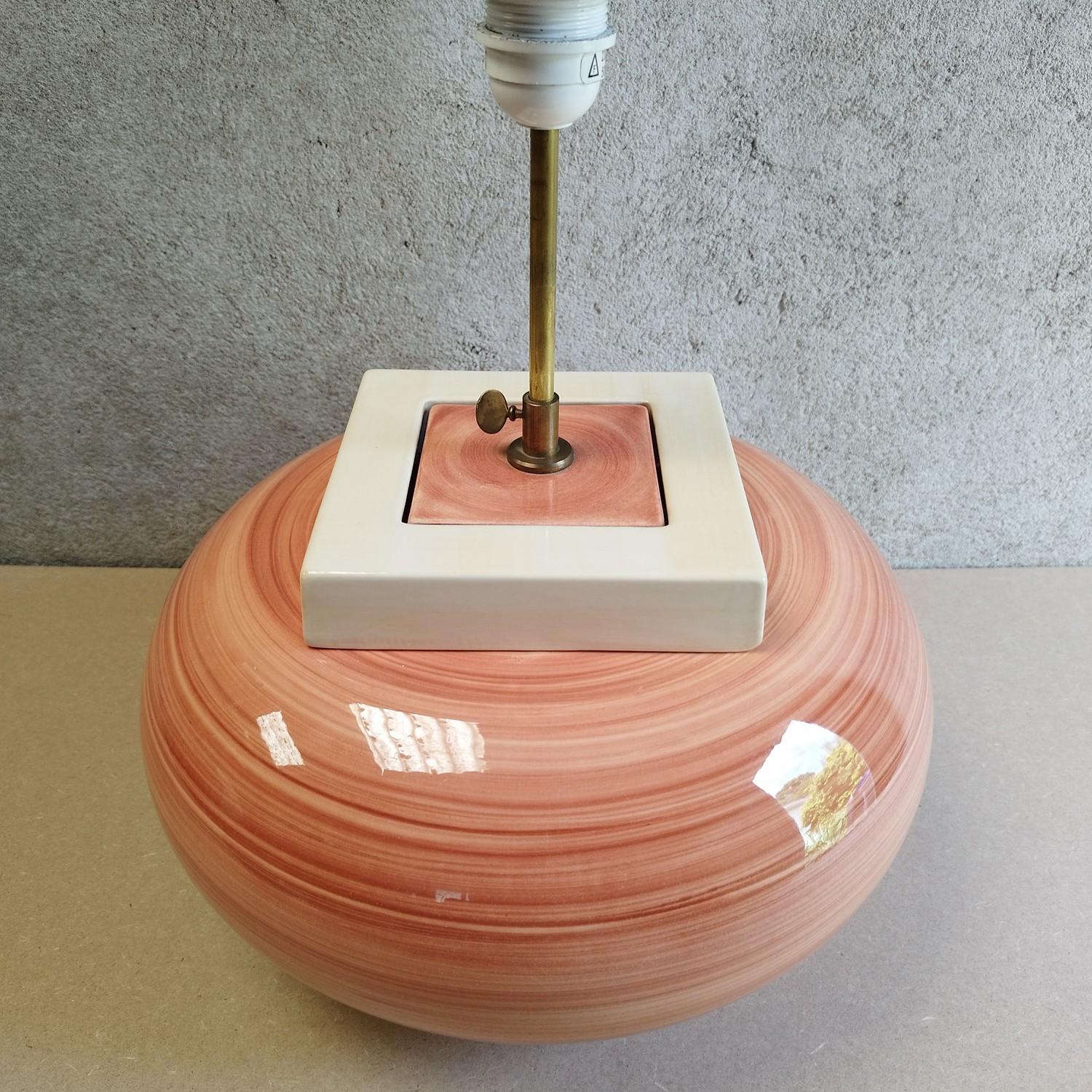 Large ceramic lamp by Kostka. The shape and colors are typical of the French 1980's style. The brass stand that holds the socket is adjustable in height. One tiny chip on the base barely visible when the lamp is standing. It's wired for Europe, but