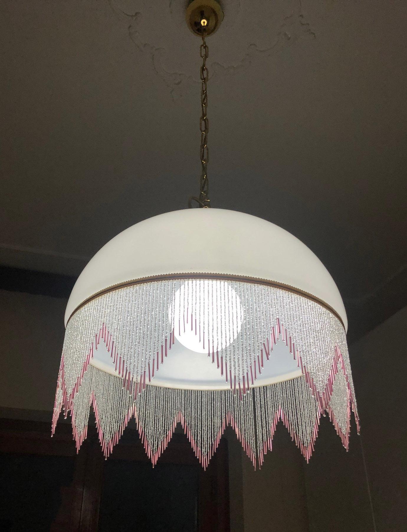 1980s glass chandelier in satin white color, with one light, special pink hanging decorations
Size cm.: 45 diameter, height 105.