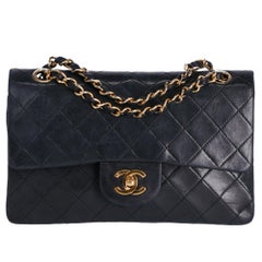 1980s Chanel 2.55 23 cm Black Leather Bag