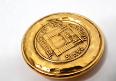 Spilla Chanel anni '80 31 Rue Cambon placcata oro