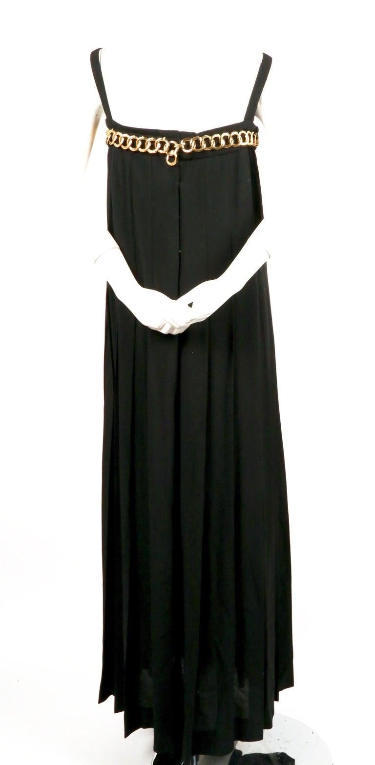 Black 1980's CHANEL black floor length hand-pleated gown with chain detail