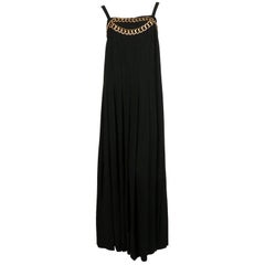 1980's CHANEL black floor length hand-pleated gown with chain detail