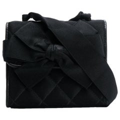 Petit sac noir vintage Chanel des années 1980