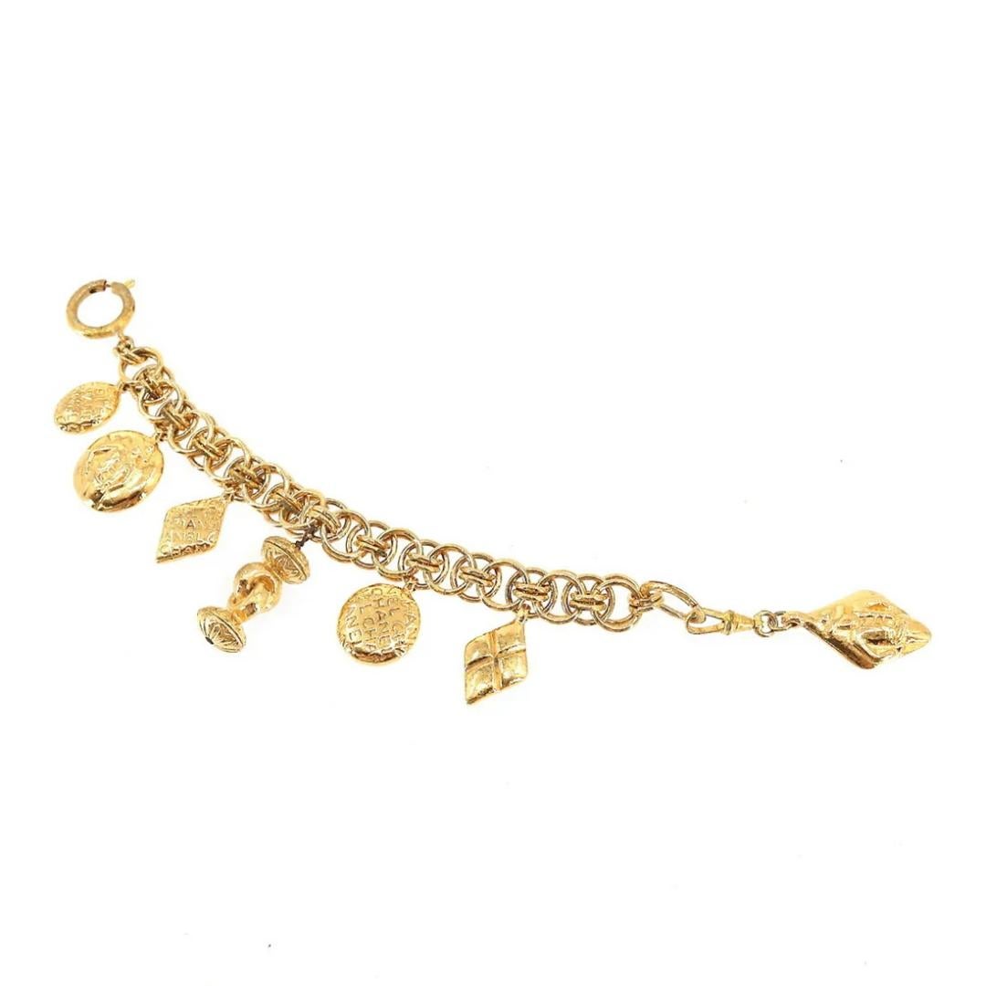 Women's 1980s Chanel Gold Chain Charm Seals Bracelet For Sale