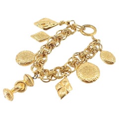1980 Chanel - Bracelet à breloques et chaînes en or