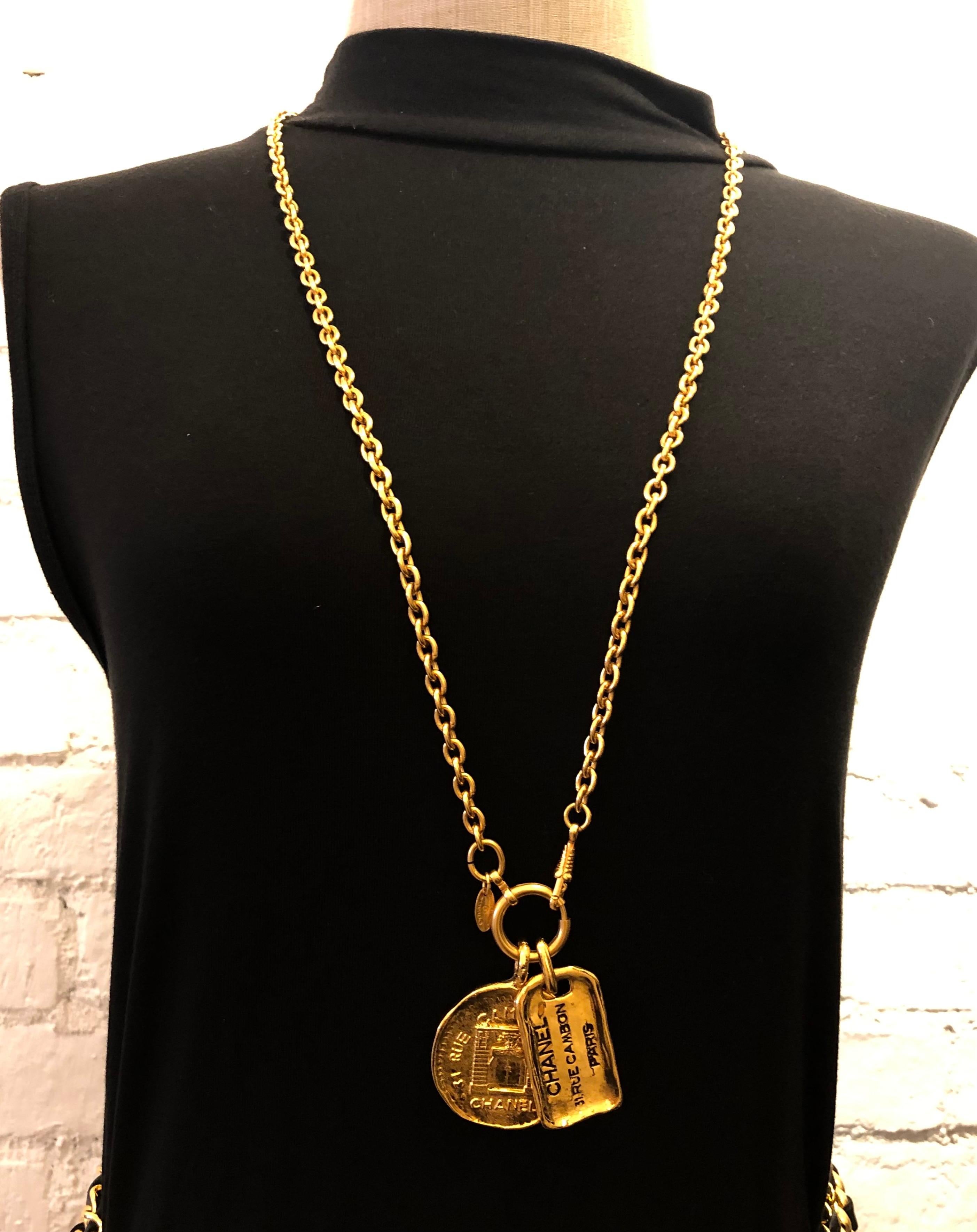 1980s Vintage Chanel Gold Toned 31 Rue Cambon Charm Necklace  6