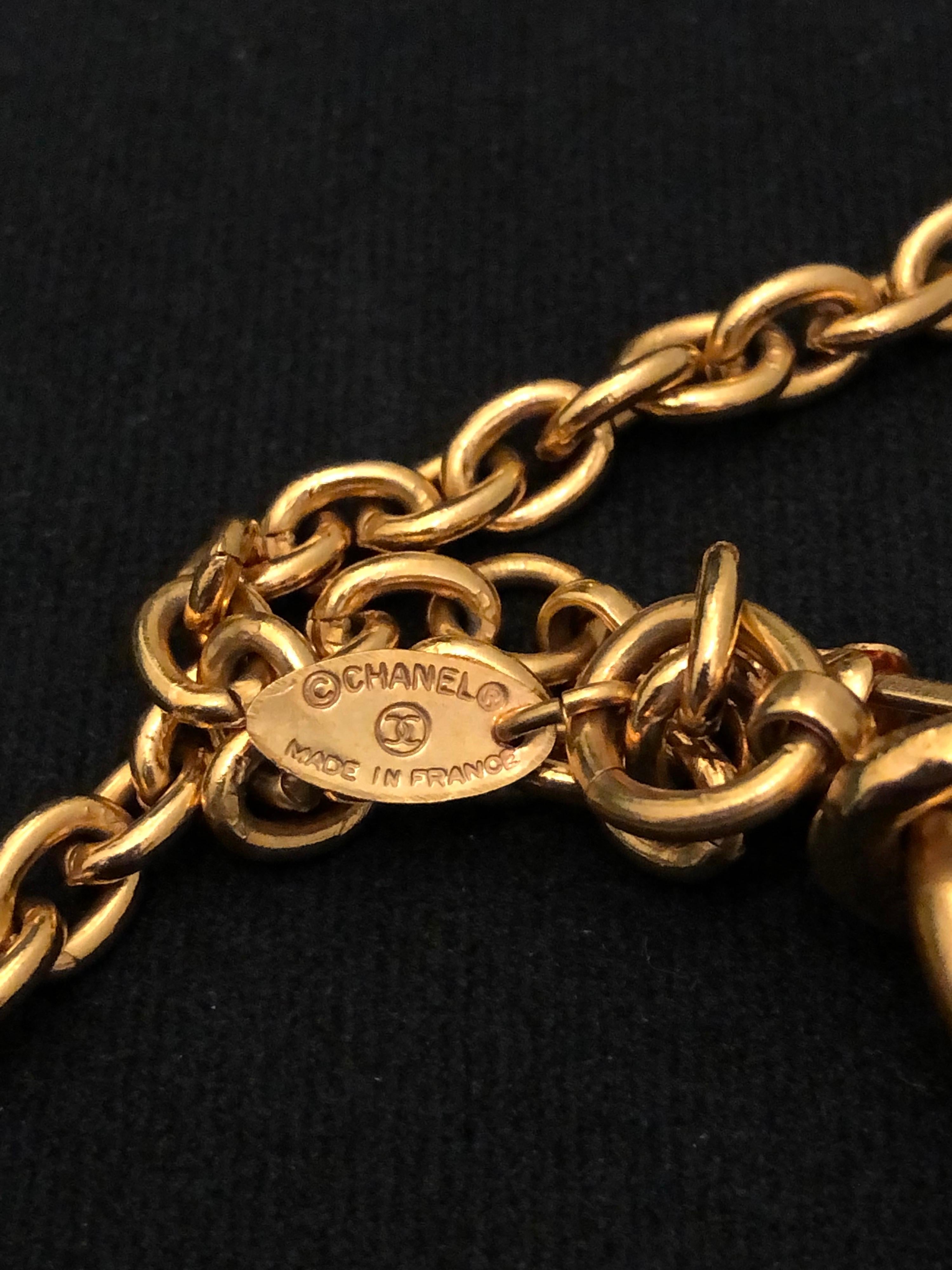 1980s Vintage Chanel Gold Toned 31 Rue Cambon Charm Necklace  3
