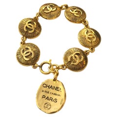 1980s Chanel Gold Toned 31 Rue Cambon Coin Bracelet