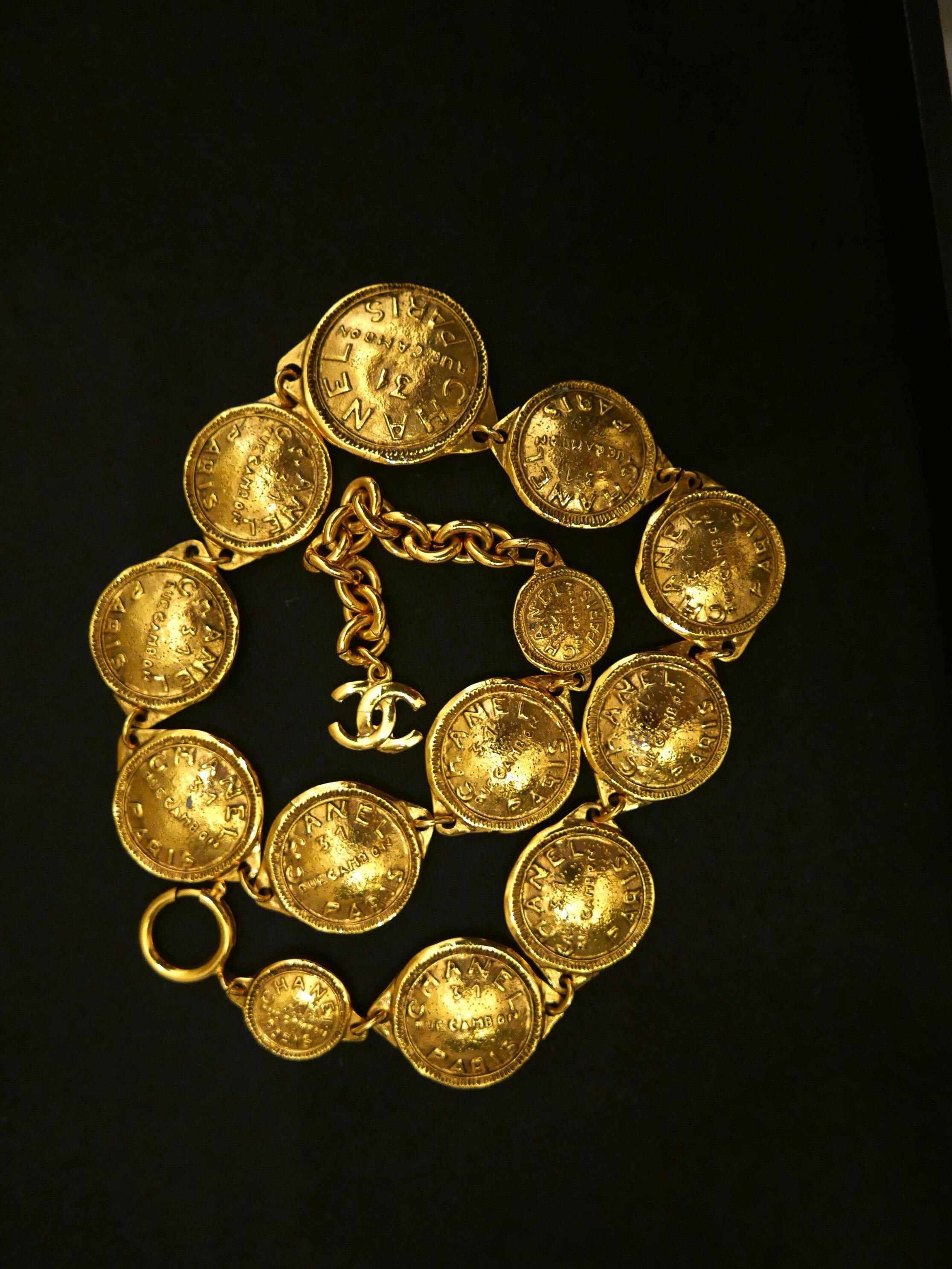 Women's 1980s Vintage CHANEL Gold Toned 31 Rue Cambon Paris Coin Necklace