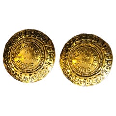 1980s Vintage CHANEL Gold Toned 31 Rue Cambon Paris Medallion Clip-On Earrings