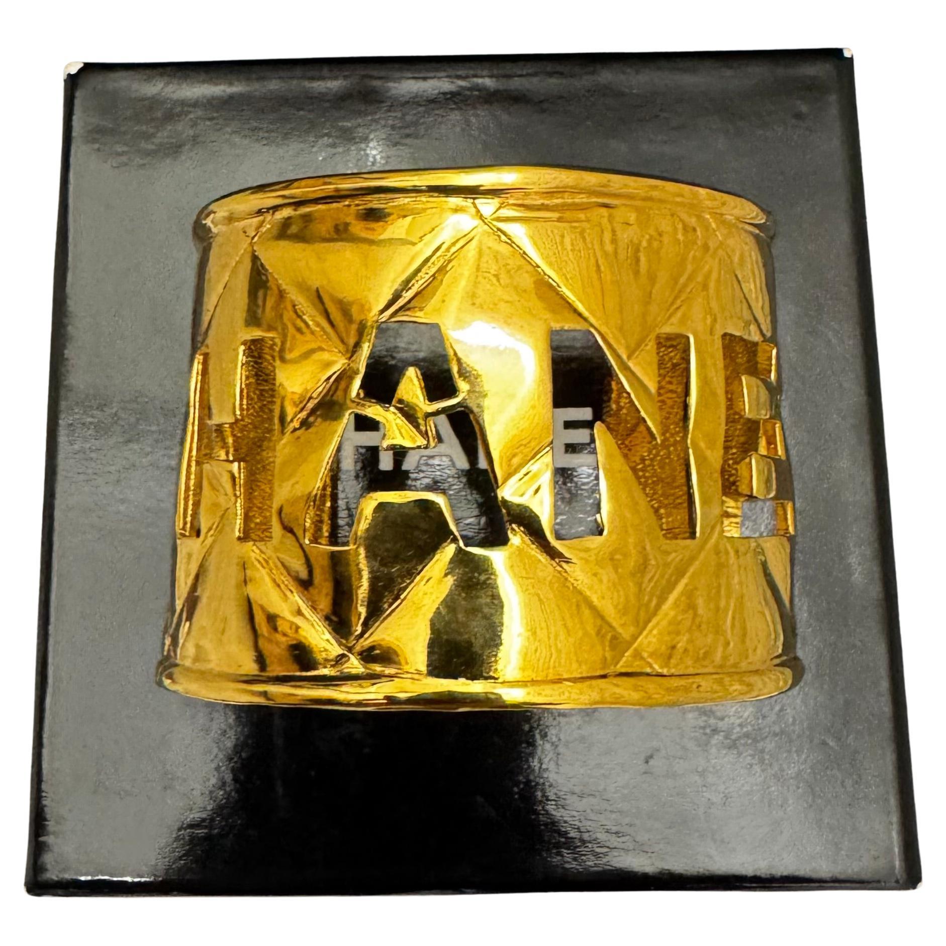 1980s Chanel Gold Toned Cut Out Cuff Bracelet For Sale