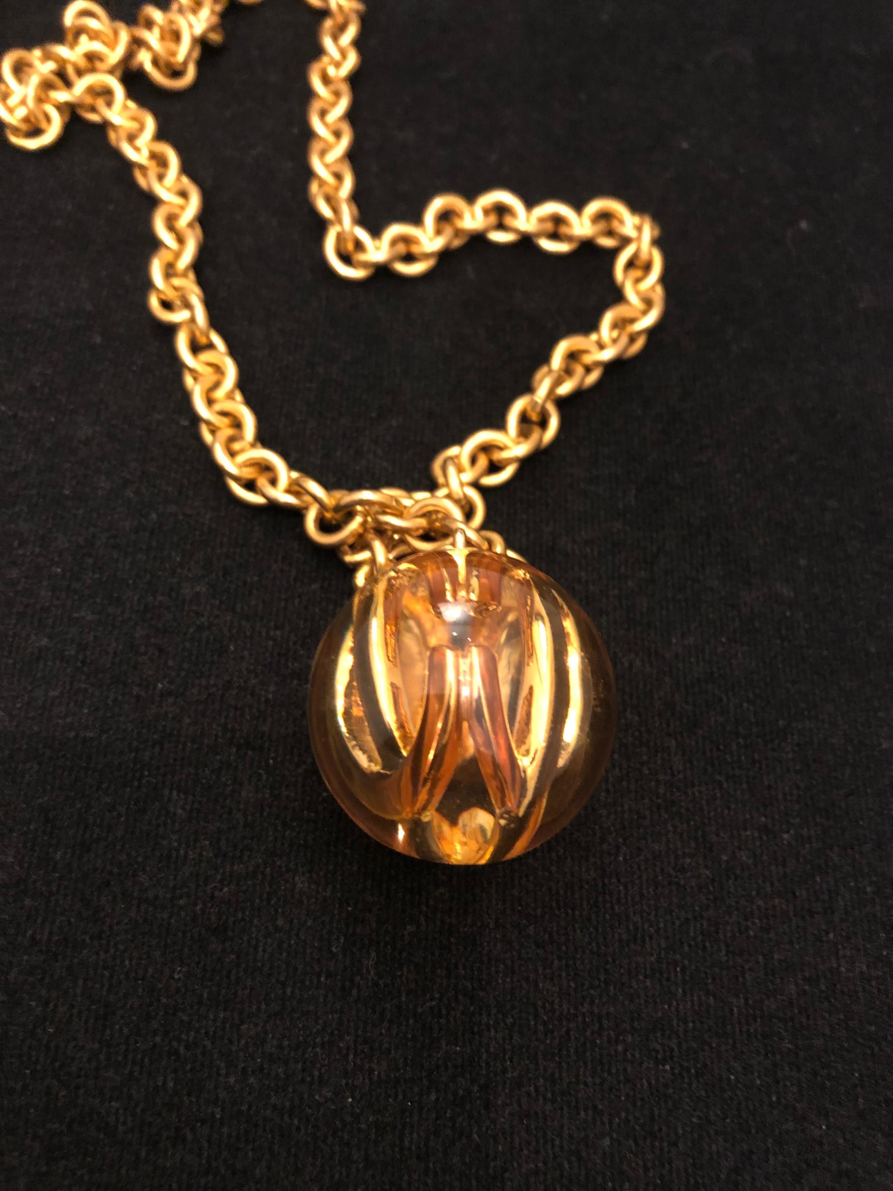 1980s Chanel Gold Toned Long Chain Necklace with CC Resin Ball Charm In Good Condition In Bangkok, TH