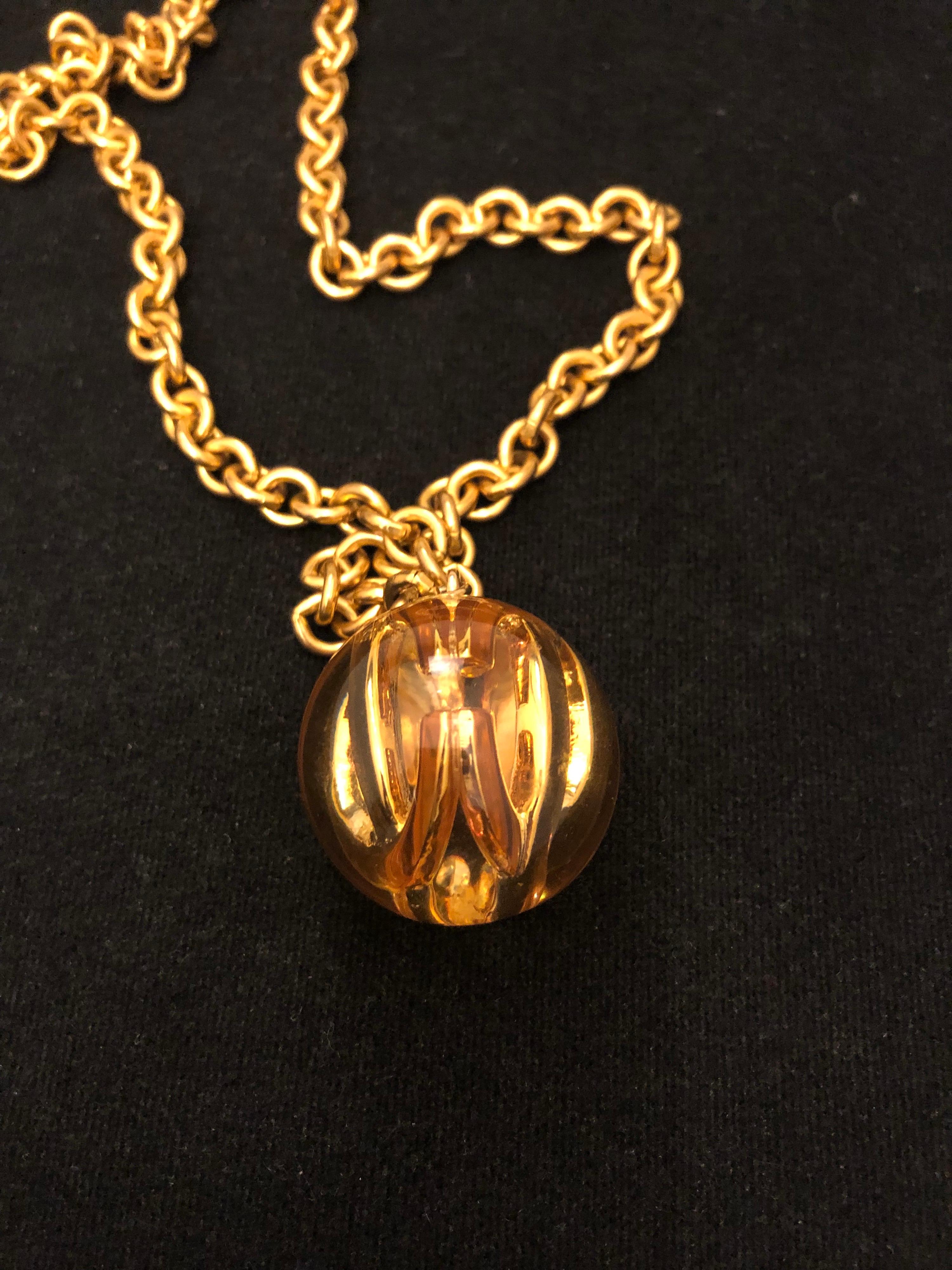 Women's or Men's 1980s Chanel Gold Toned Long Chain Necklace with CC Resin Ball Charm